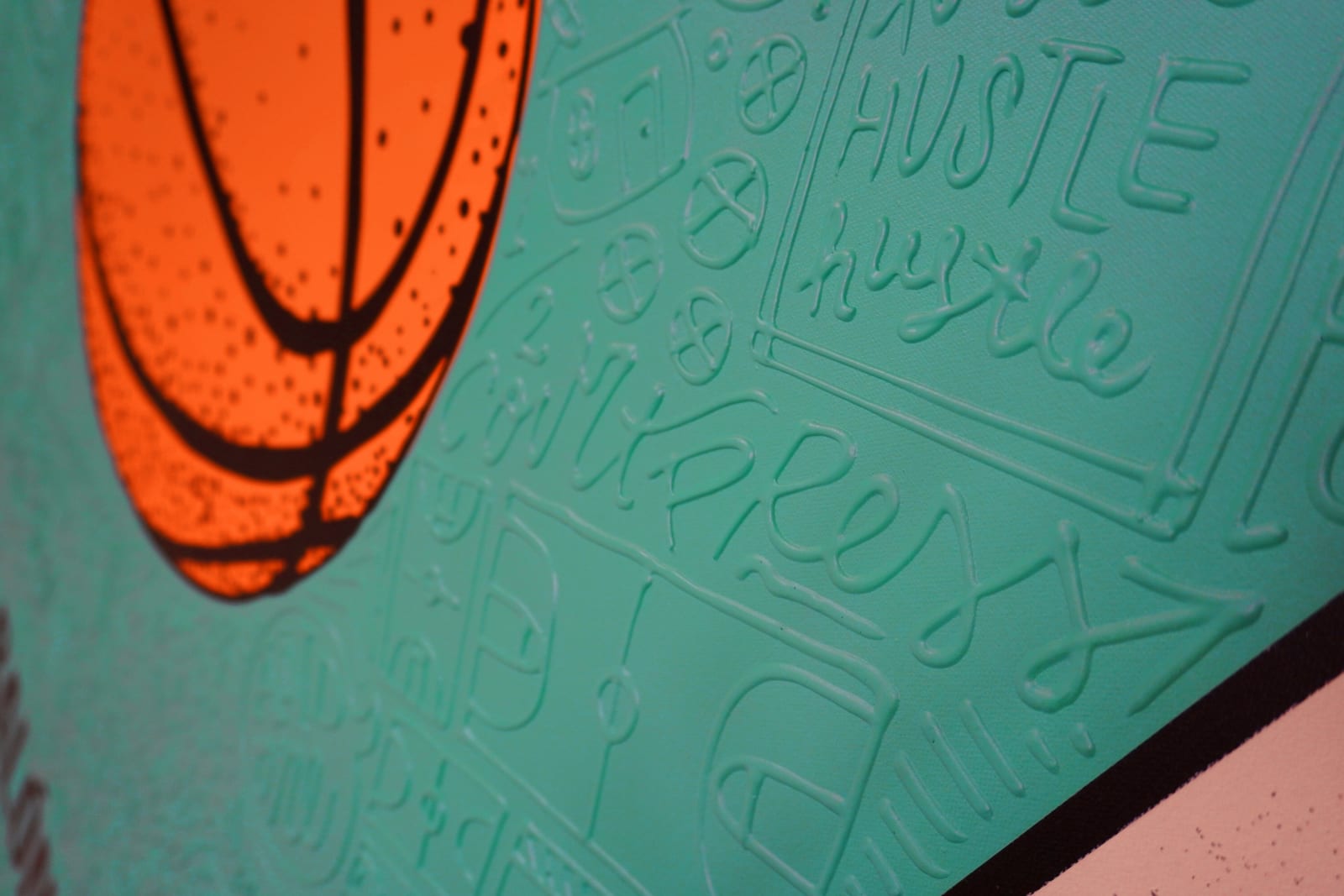 Detail photo of “El Balón”, painting by Cayla Birk artist from South Florida. Available at Carousel Fine Art Chicago. The artist’s technique blends traditional acrylic paints with unique materials, creating a distinct mixed media style. Birk's work is marked by intricate designs and recognizable gestures, combining contemporary culture, history, music, and literature. Her art challenges conventional thinking, offering new and unexpected experiences. Colors of this work : Teal, Orange, Beige, Black