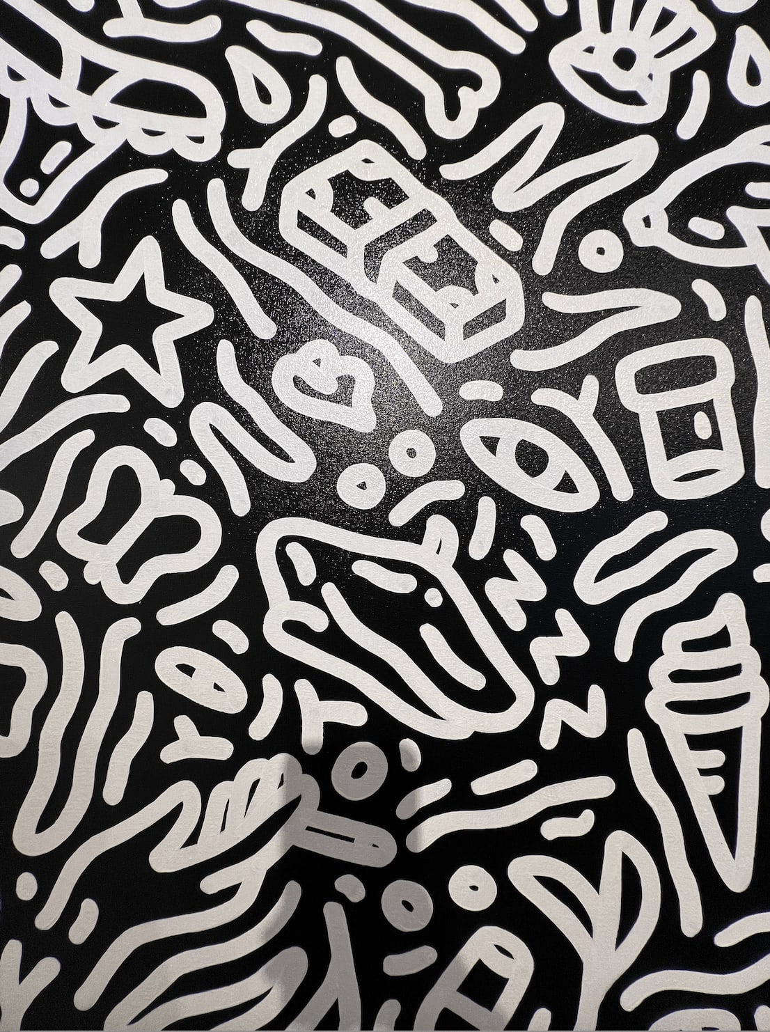 Detail photo of “Night in St. Tropez”, painting by Chance Cooper artist from United States, based in LA. Available at Carousel Fine Art Atlanta. The artist's technique with oil on canvas celebrates the sacred art of storytelling, with each painting evoking the sense of a page torn from one’s life. His work is recognized as a playground where his characters reveal their existential secrets. Colors of this work : Black, White