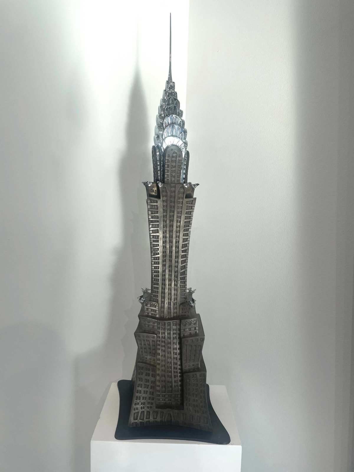 “Chrome Arrow” , sculpture by Alain Godon artist from France. Available at Carousel Fine Art Miami.