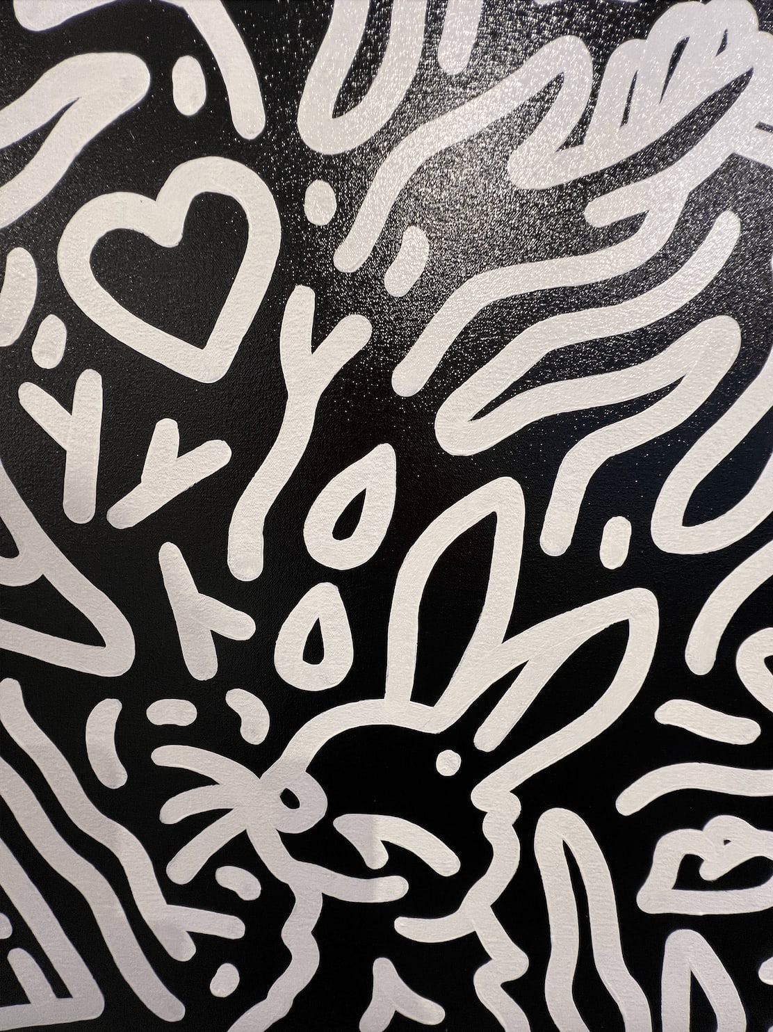 Detail photo of “Night in St. Tropez”, painting by Chance Cooper artist from United States, based in LA. Available at Carousel Fine Art Atlanta. The artist's technique with oil on canvas celebrates the sacred art of storytelling, with each painting evoking the sense of a page torn from one’s life. His work is recognized as a playground where his characters reveal their existential secrets. Colors of this work : Black, White