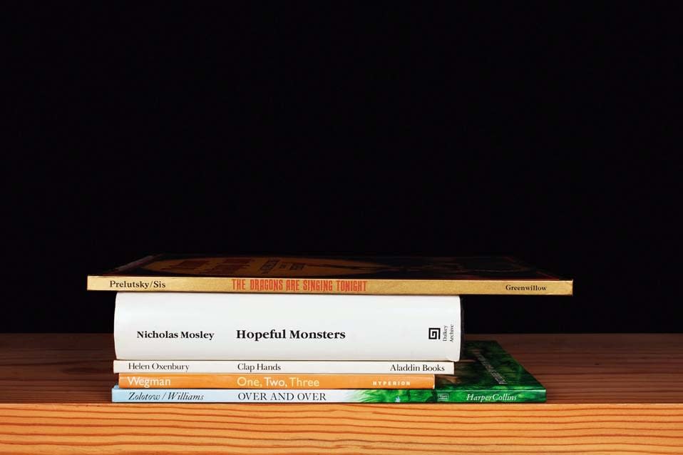 Nina Katchadourian, The Dragons Are Singing Tonight from the series Family Gathering, 2013 ("Sorted Books" project, 1993-ongoing), 2013