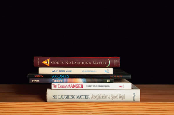 Nina Katchadourian, God Is No Laughing Matter from the series Family Gathering, 2013 ("Sorted Books" project, 1993-ongoing), 2013