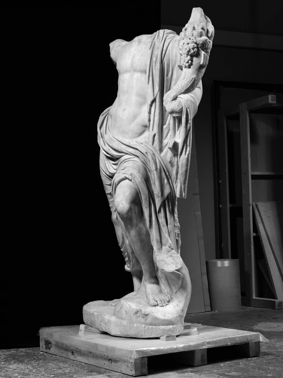 *MONUMENTAL MARBLE FIGURE OF BONUS EVENTUS, Roman Empire, 2nd Century A.D.