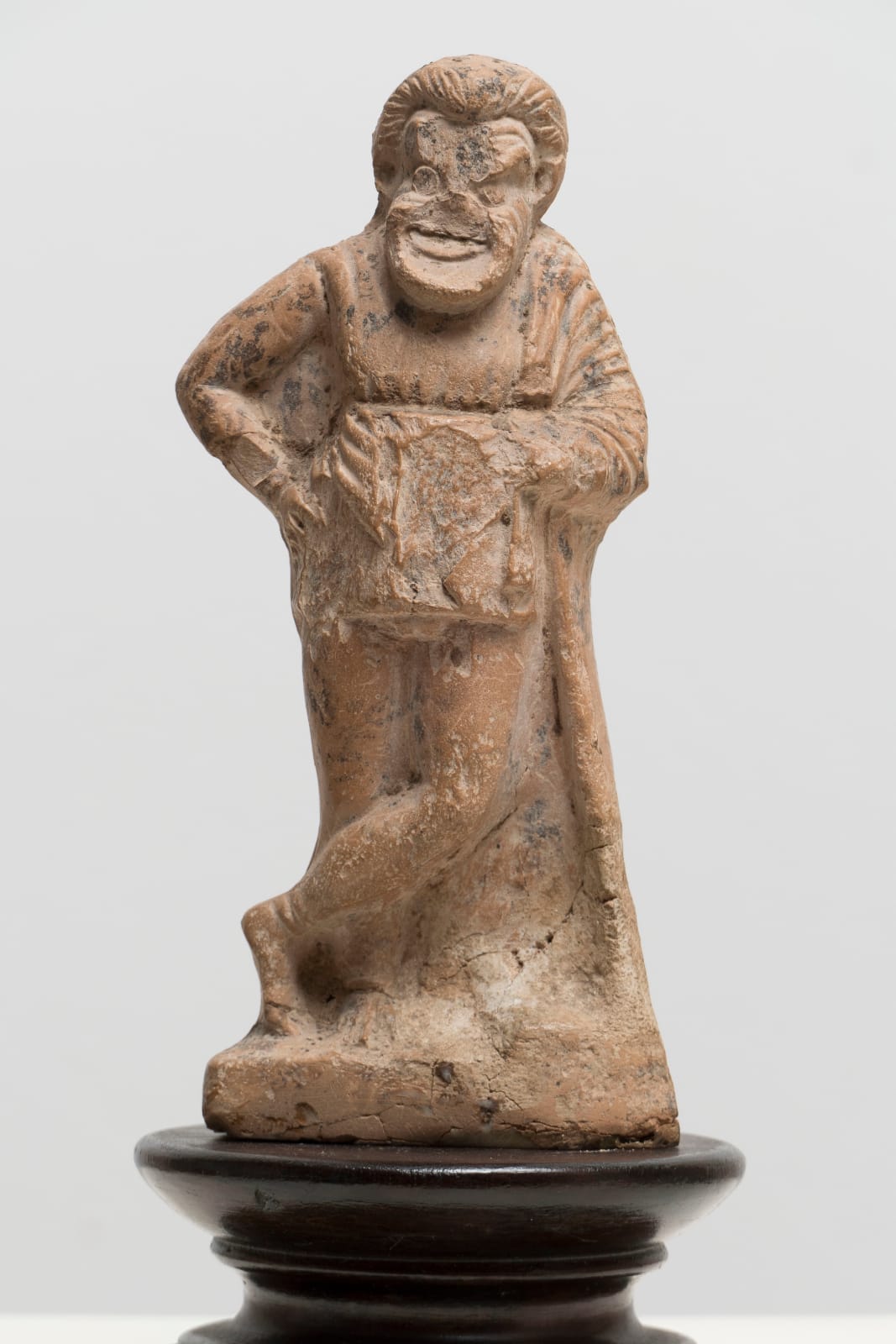 TERRACOTTA FIGURINE OF A COMIC ACTOR, Greece, c. 350 B.C.