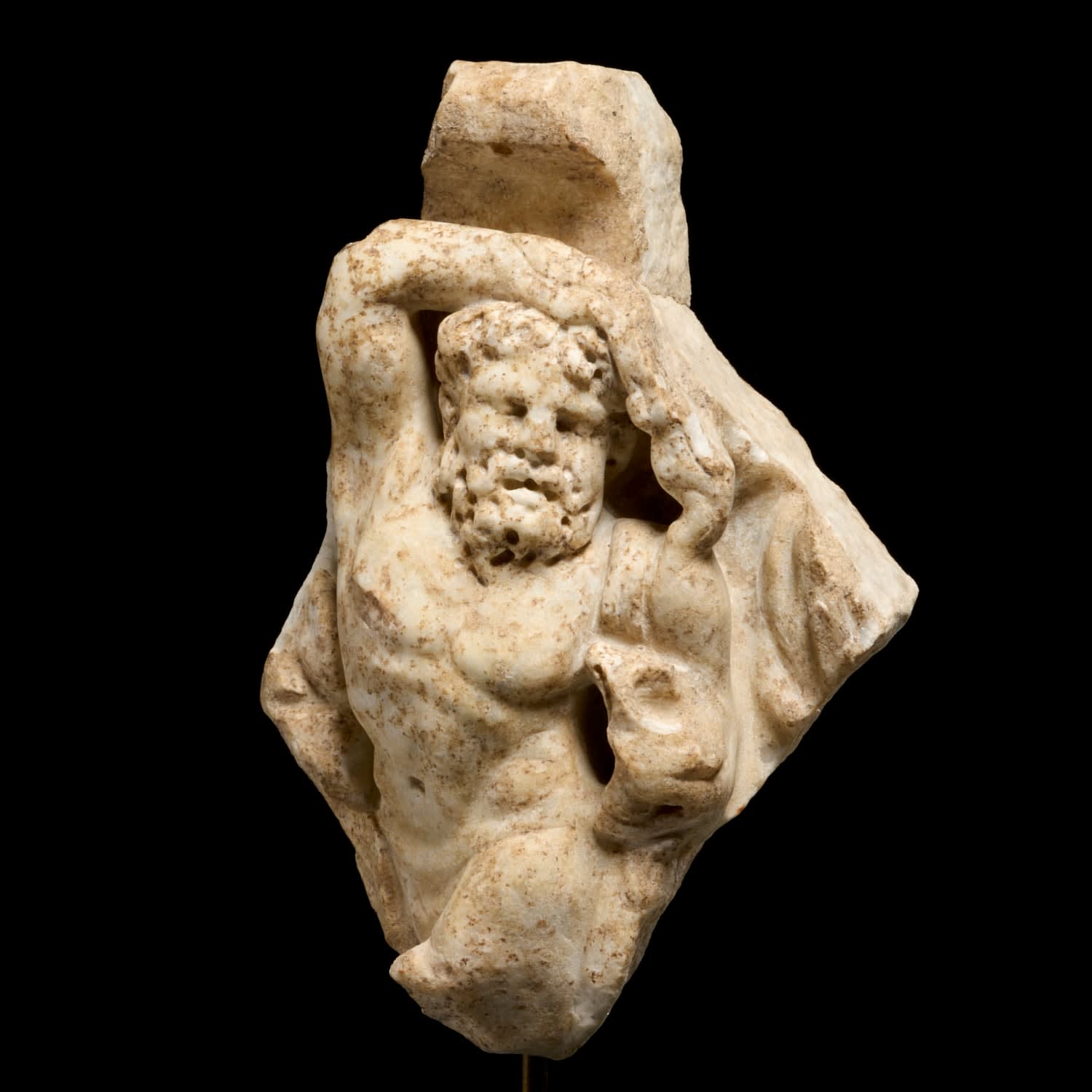 RELIEF FRAGMENT OF A DANCING SATYR, Roman Empire, 1st Century B.C.