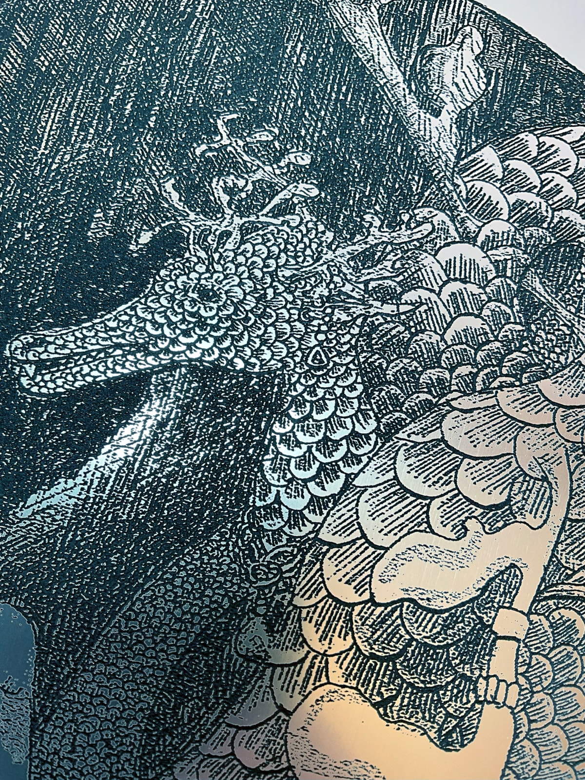 Andromeda and Dragon, laser engraving on brushed silver acrylic sheet, based on original hand drawing by Charlie Kirkham