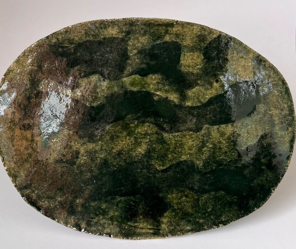 ARD, Oval green plate with wave detail, 2025