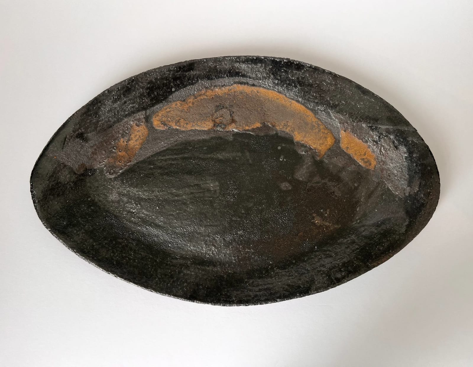 ARD, Black and gold oval platter, 2025