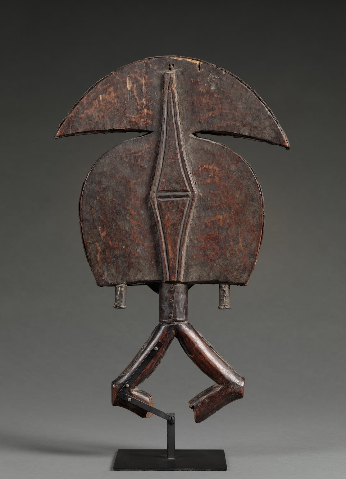 ATTRIBUTED TO SEMANGOY, Reliquary Figure, Kota, Gabon. Late 19th-early 20th century