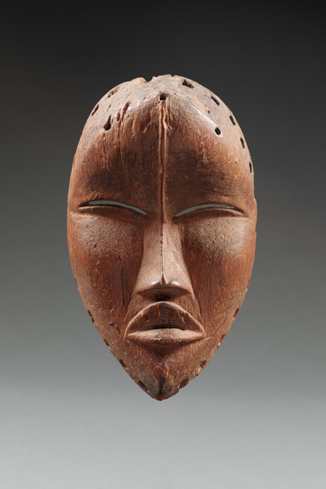DAN ARTIST, Mask, Ivory Coast, late 19th-early 20th century