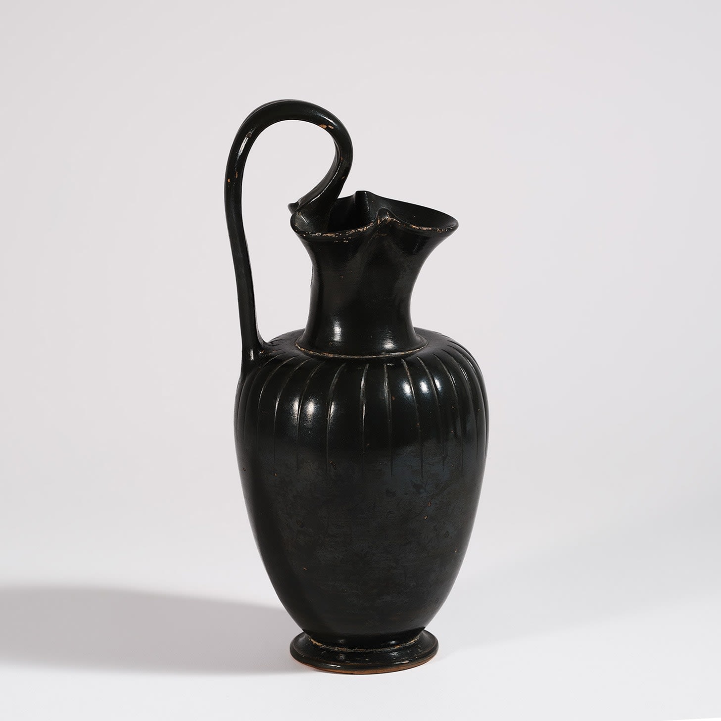 Black-glazed Trefoil-Lipped ribbed Oinochoe, Apulian, Greek, 4th century B.C.