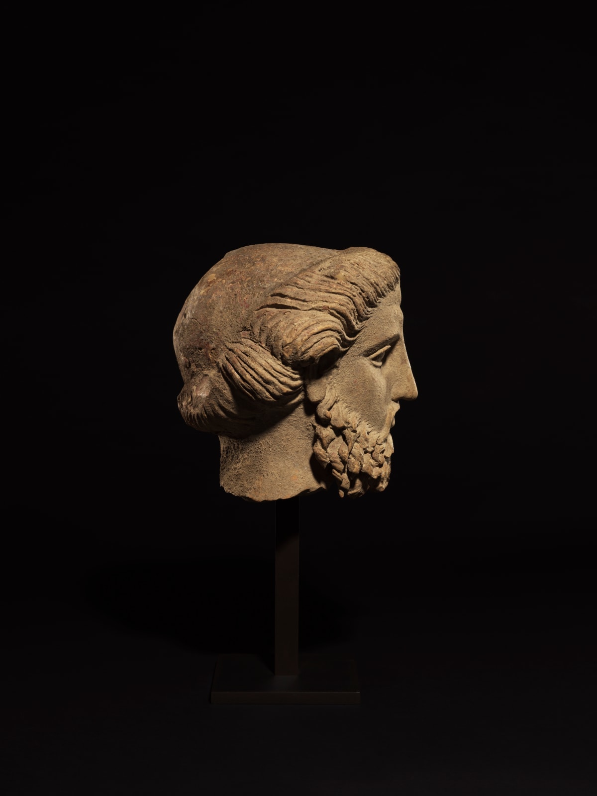 SOUTH ITALIAN GREEK, Fragmentary Head of a Bearded God, South Italian Greek, c. 4th century BC
