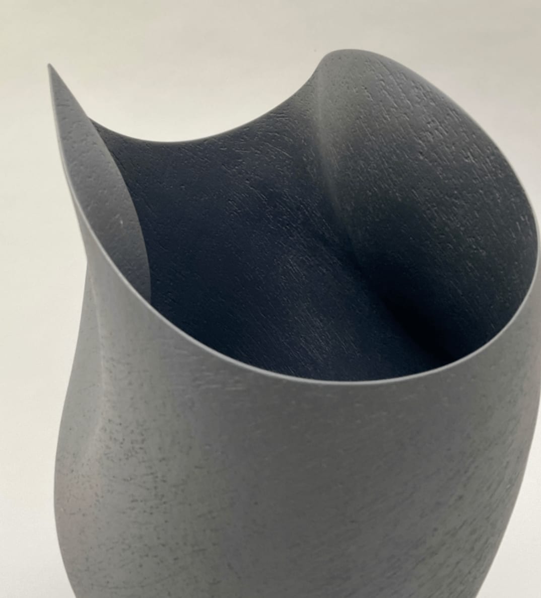 Ashraf Hanna, Large black undulating vessel with triangular base