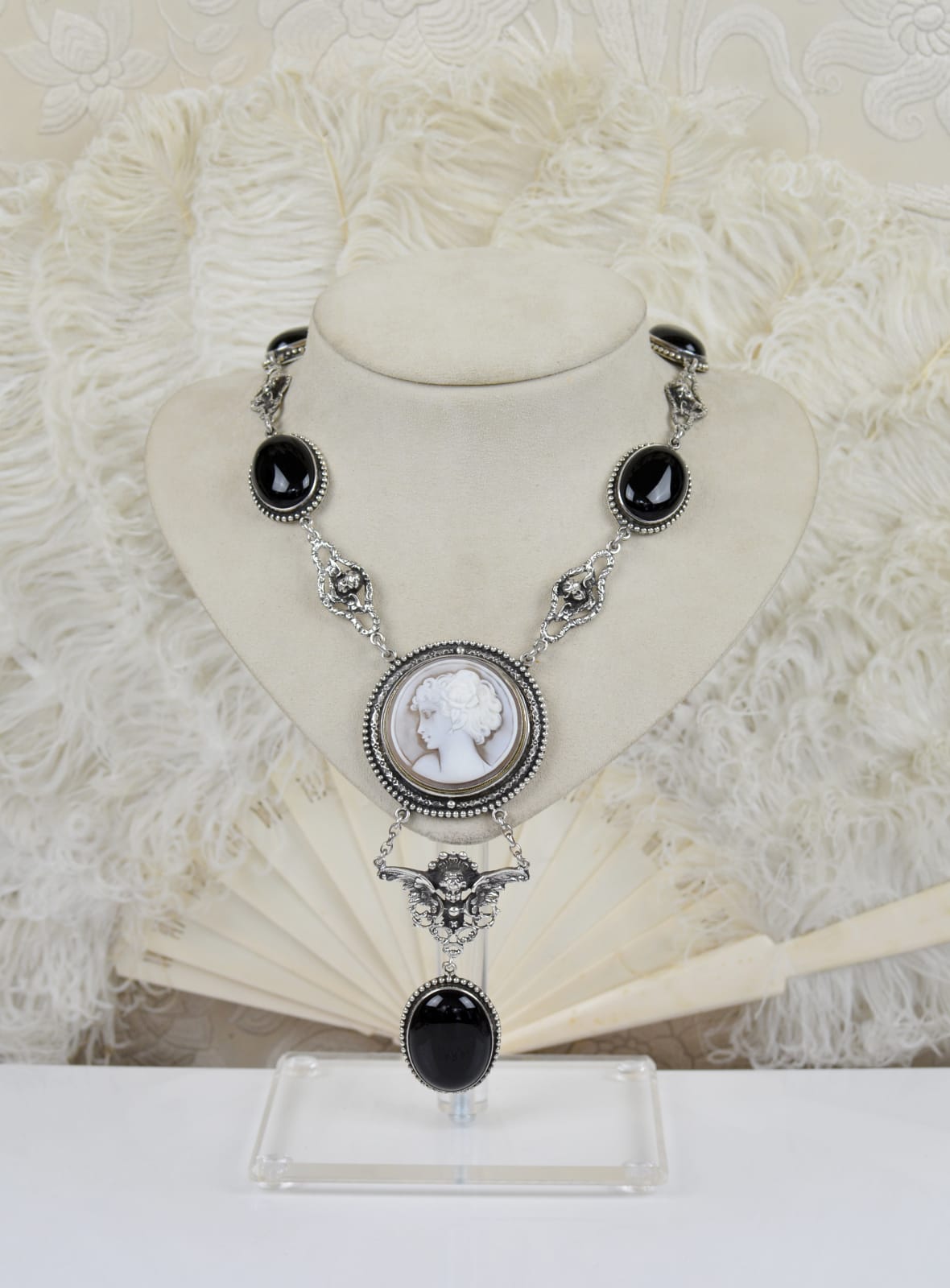 Jill Garber, ANTIQUE ART DECO HAND CARVED CAMEO DEPICTING AND ARISTOCRATIC DEBUTANT ON IMPRESSIVE BLACK ONYX WITHIN UNIQUE ORIGINAL ROCOCO STYLE FIGURAL ANGEL COMPONENT CHAIN.