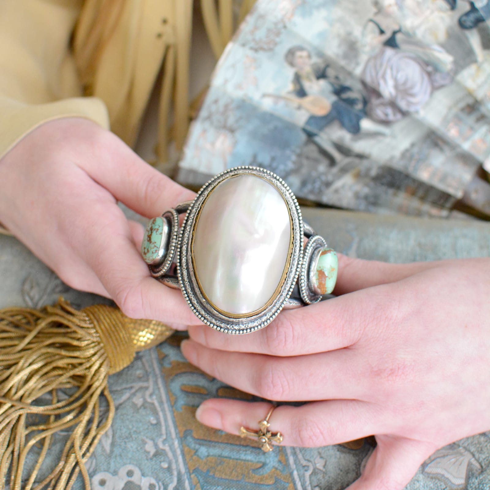 Jill Garber, Large Victorian 19th Century high dome natural mother of pearl cuff bracelet with large rosemary green Royston turquoise cabochons