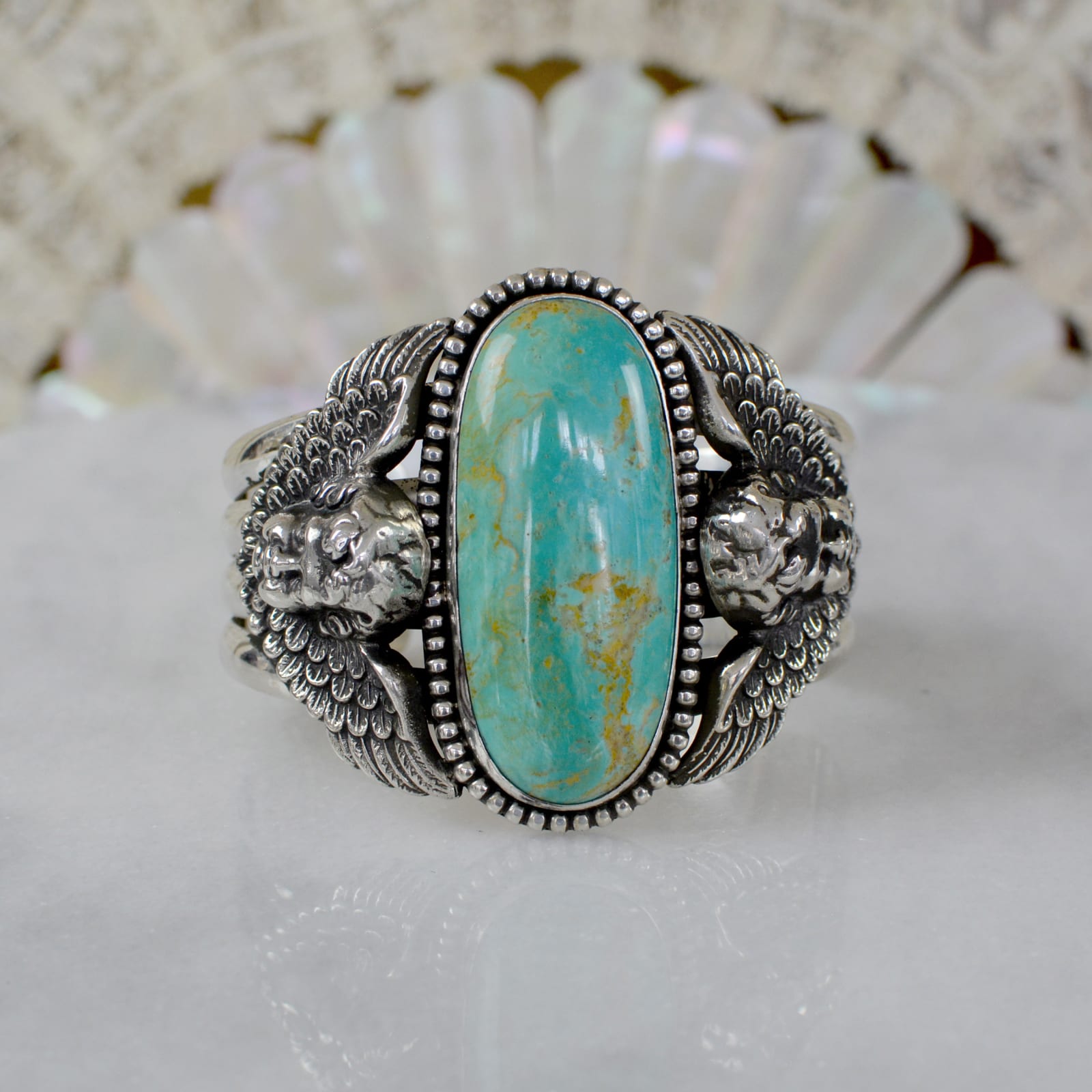 Jill Garber, STUNNING LARGE HAND CUT, NATURAL ROYSTON TURQUOISE CABOCHON WISDOM CUFF WITH ROCOCO FIGURAL GUARDIAN ANGELS