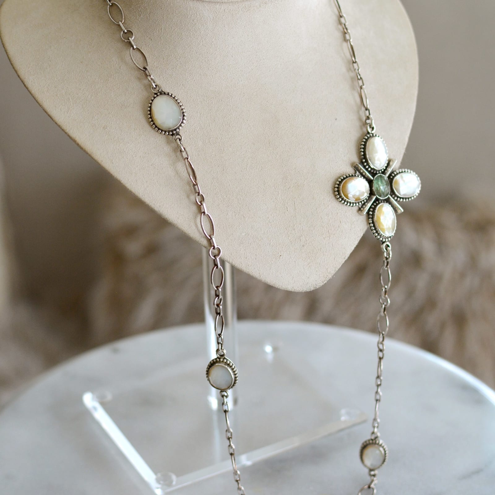 Jill Garber, Original design as an off-center cross necklace contained within her complex multi-link sterling silver chain