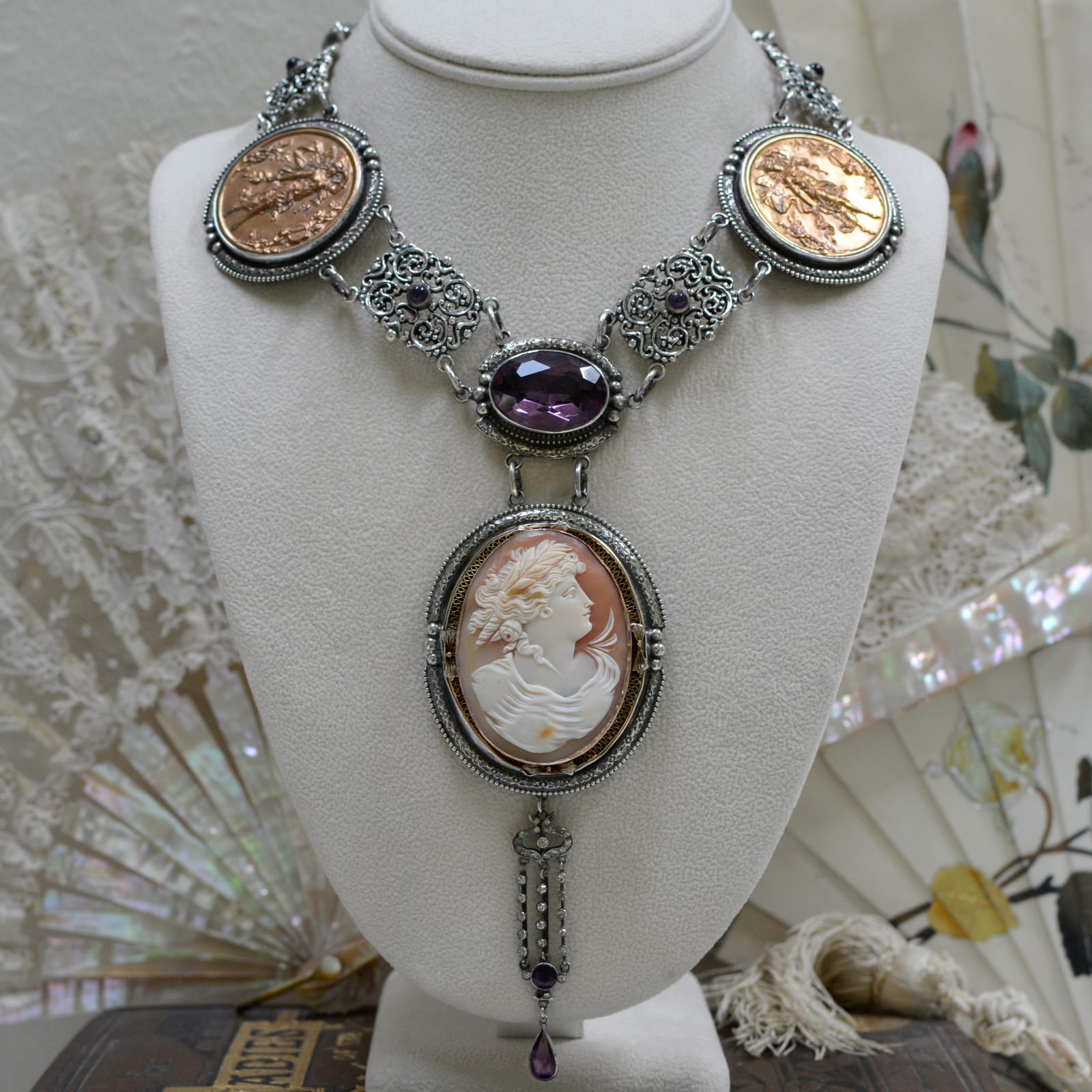 Jill Garber, STUNNING 45 CARAT FACETED AMETHYST DROP NECKLACE WITH BRONZE MEDALLIONS, AUSTRO HUNGARIAN LINKS AND FRENCH PASTE DROP