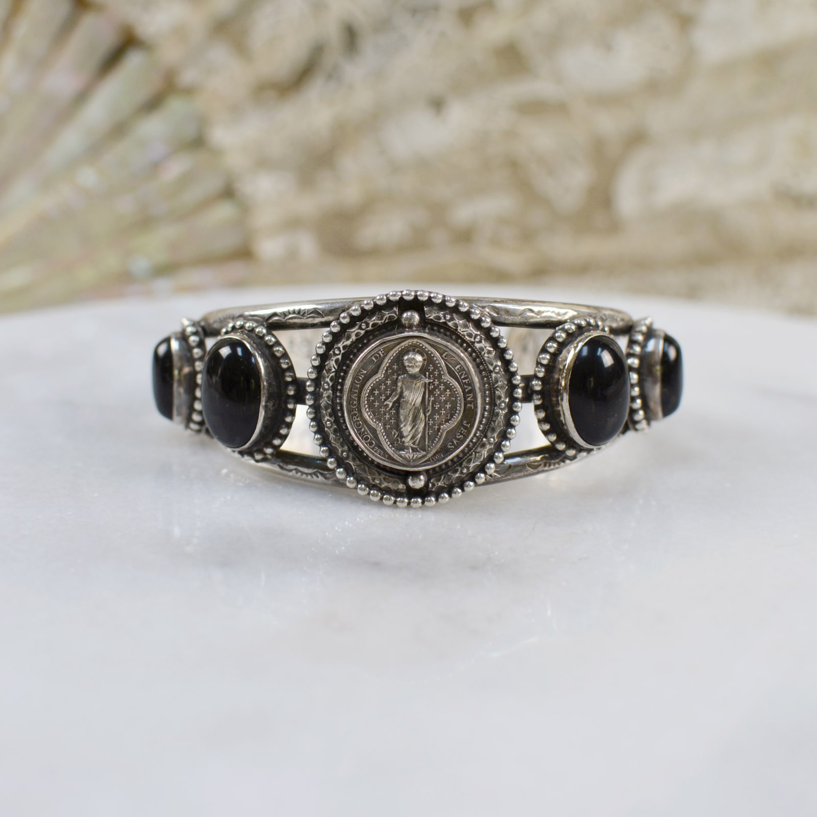 Jill Garber, WISDOM CUFF WITH ANTIQUE NINETEENTH CENTURY FRENCH, LUDOVIC PENIN ENGRAVED SACRED HEART MEDAL AND BLACK ONYX CABOCHONS