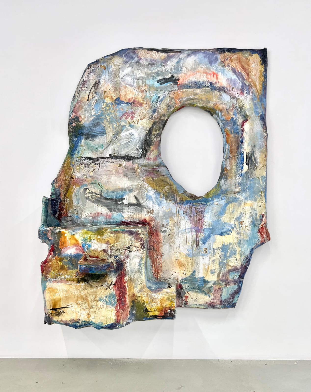 A very sculpture and gestural artwork in blues, whites, reds and yellow.
