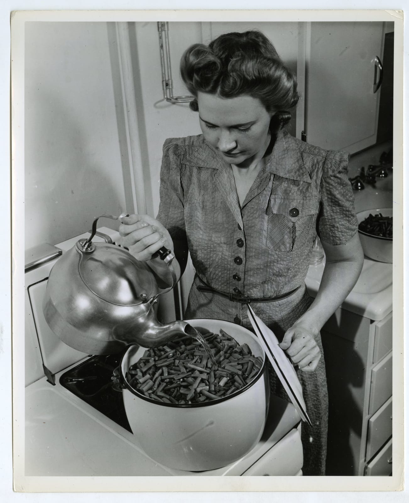 Various Photographers, Large Group of Photos Demonstrating Home-Canning as Part of the "Victory Gardens" War Effort, 1942-44