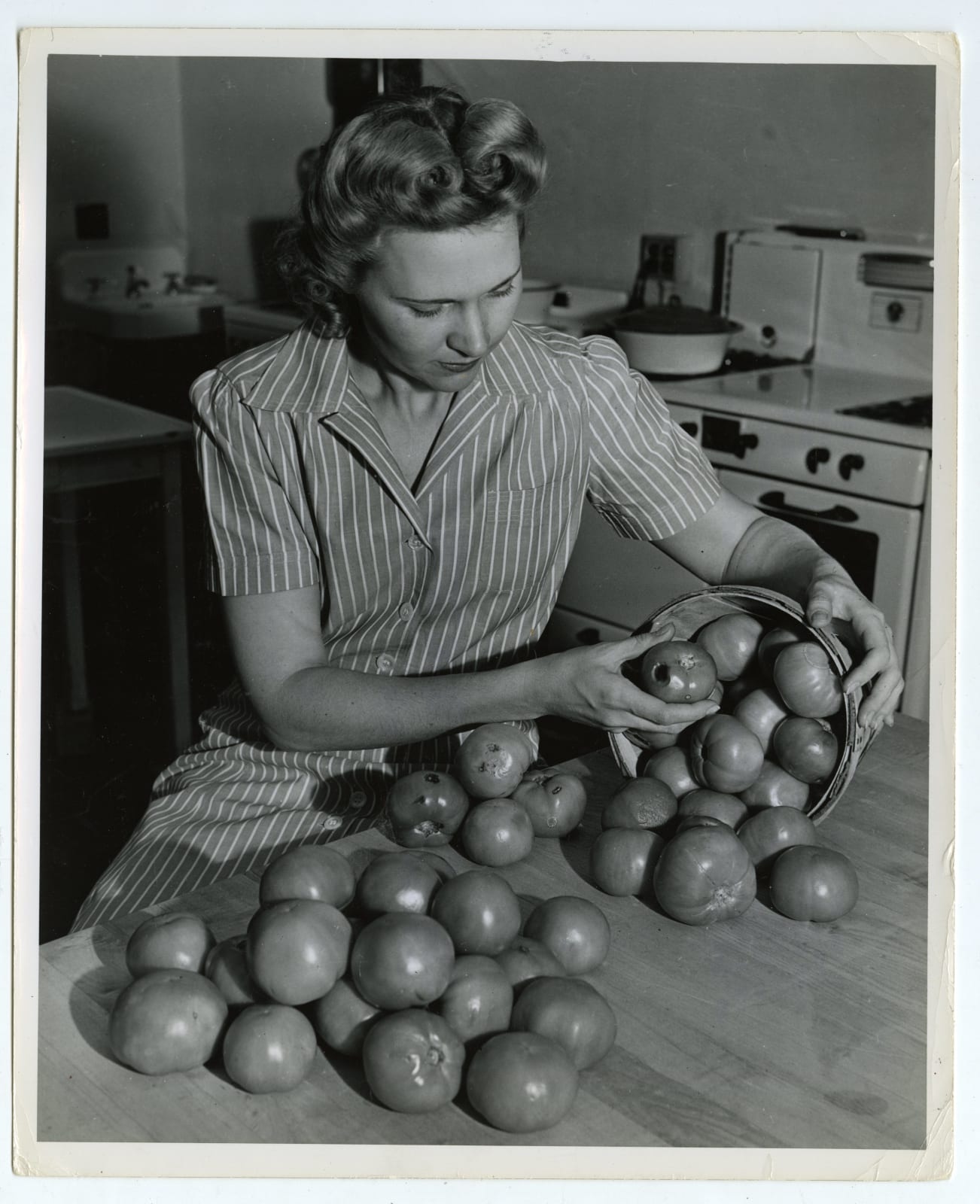 Various Photographers, Large Group of Photos Demonstrating Home-Canning as Part of the "Victory Gardens" War Effort, 1942-44