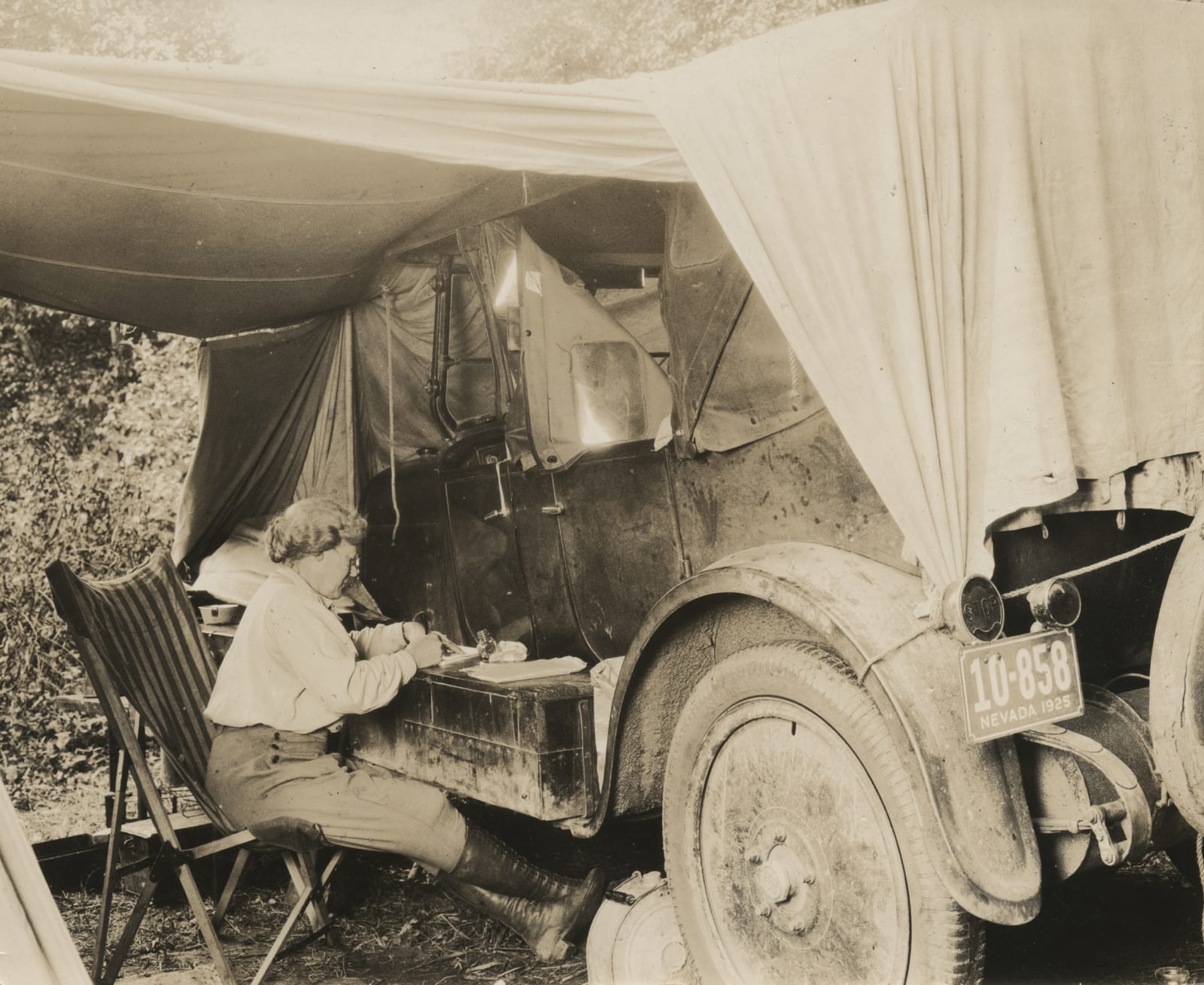 [Auto-Camping], Letter Writing on the Auto, c. 1920