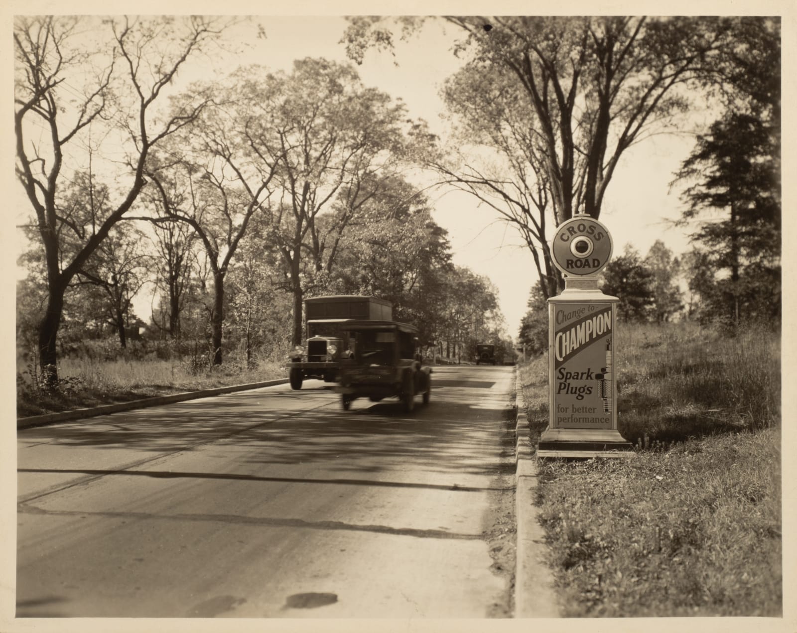 [Traffic Alerts], Photos of Roadside Alert Signs That Also Advertise Champion Spark Plugs and Local Businesses, 1920s-40s
