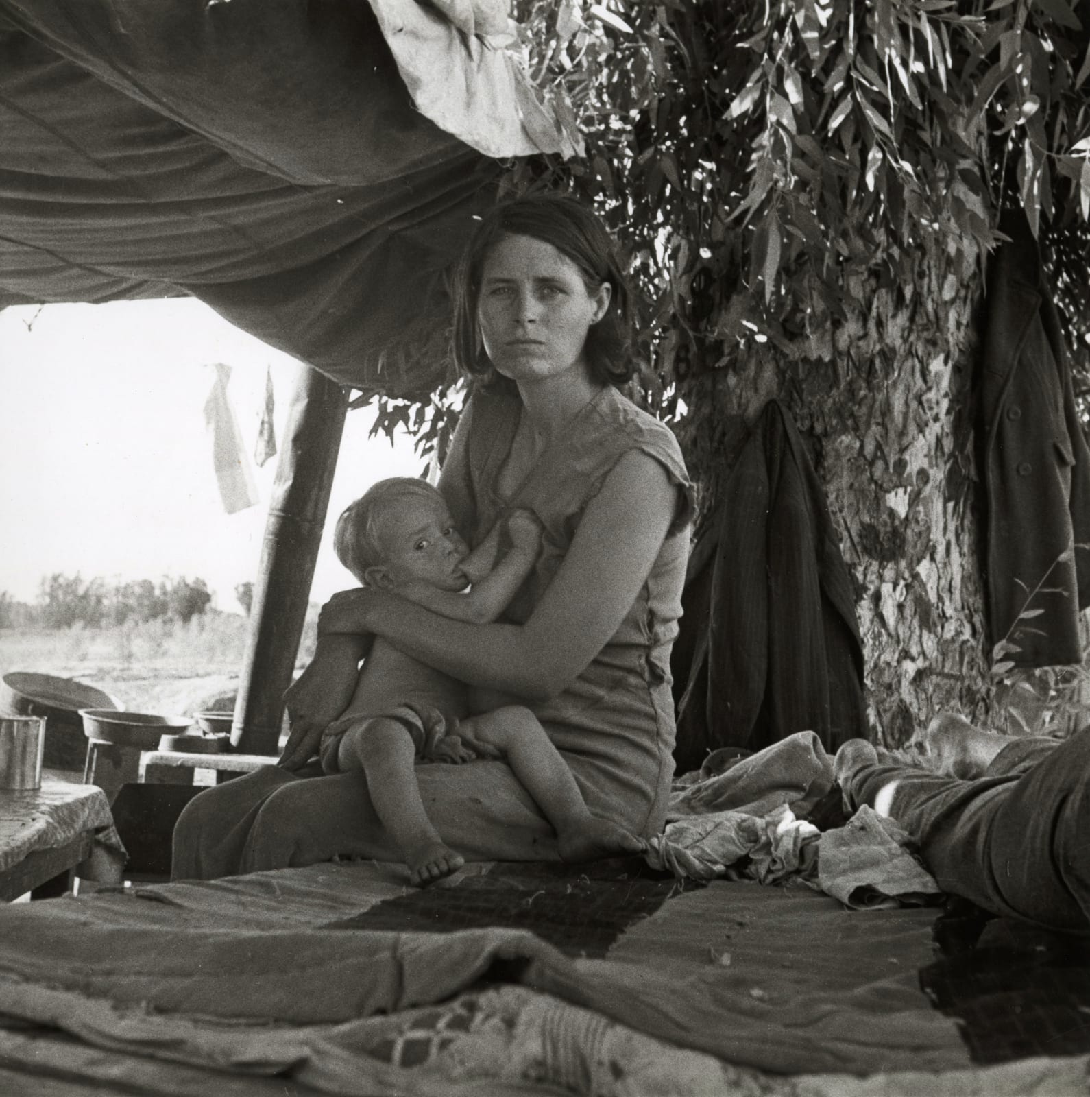 Dorothea Lange, Drought refugees from Oklahoma camping by the roadside, Blythe, California, 1937