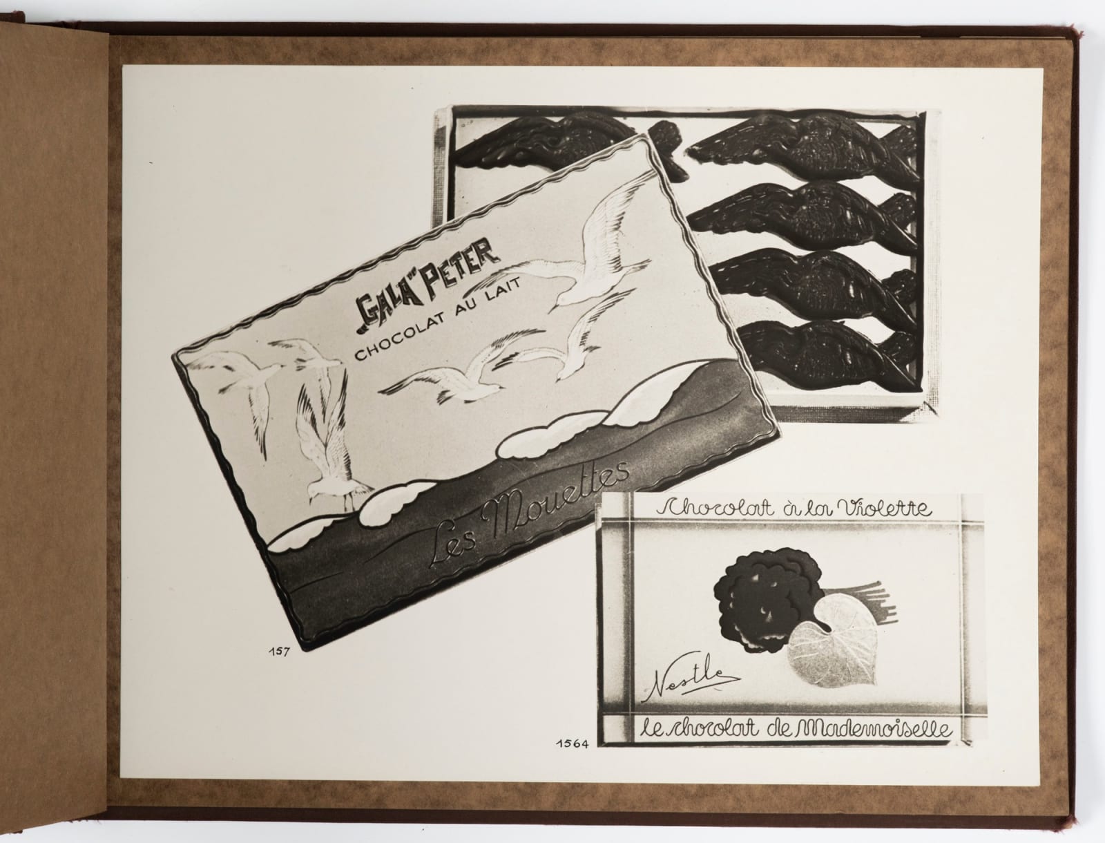 [Nestlé Chocolate], Presentation Album with Artfully-Arranged Displays of Swiss Chocolates, c. 1929