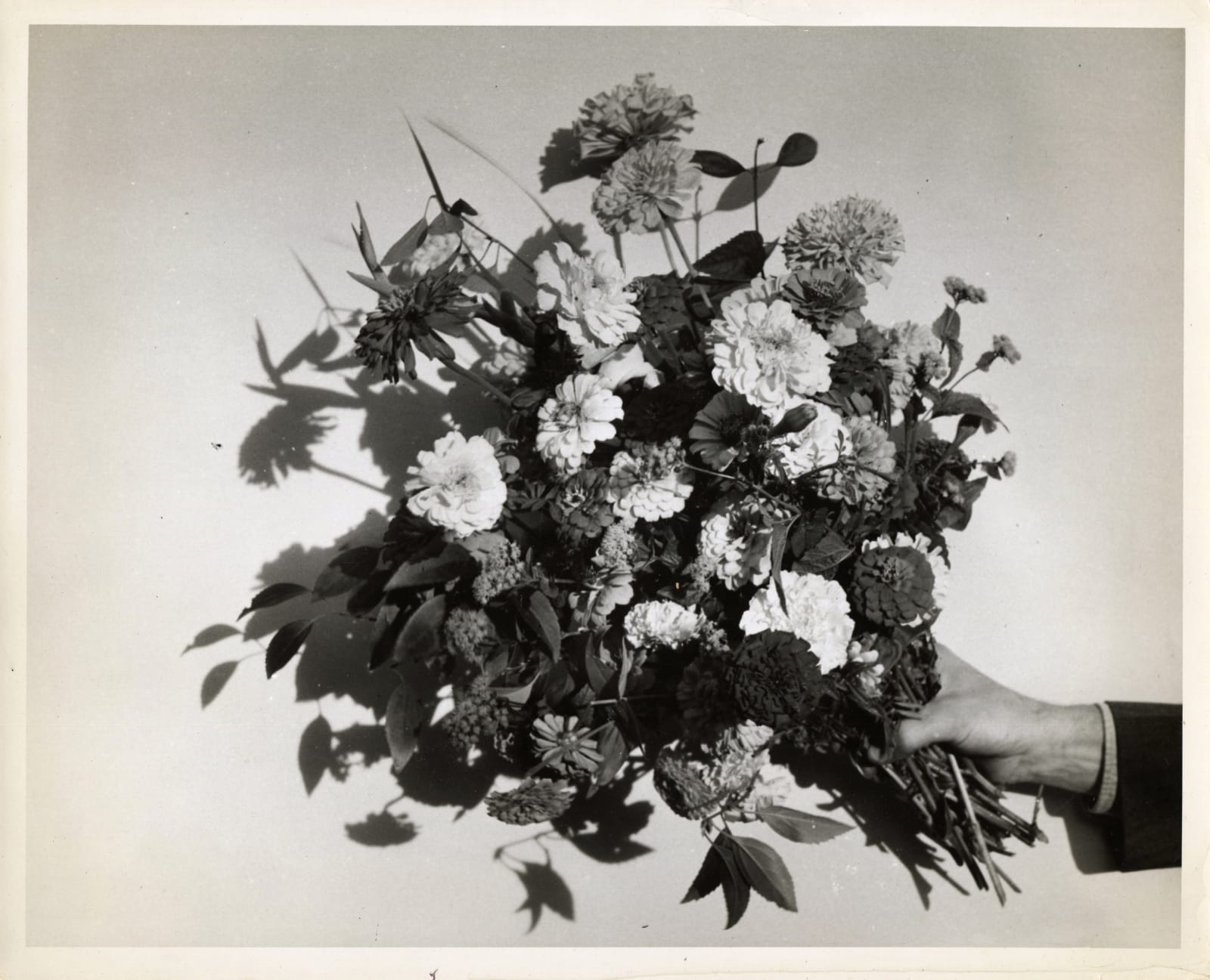 Anonymous, Unknown Hand with a Bouquet of Flowers, 1920s
