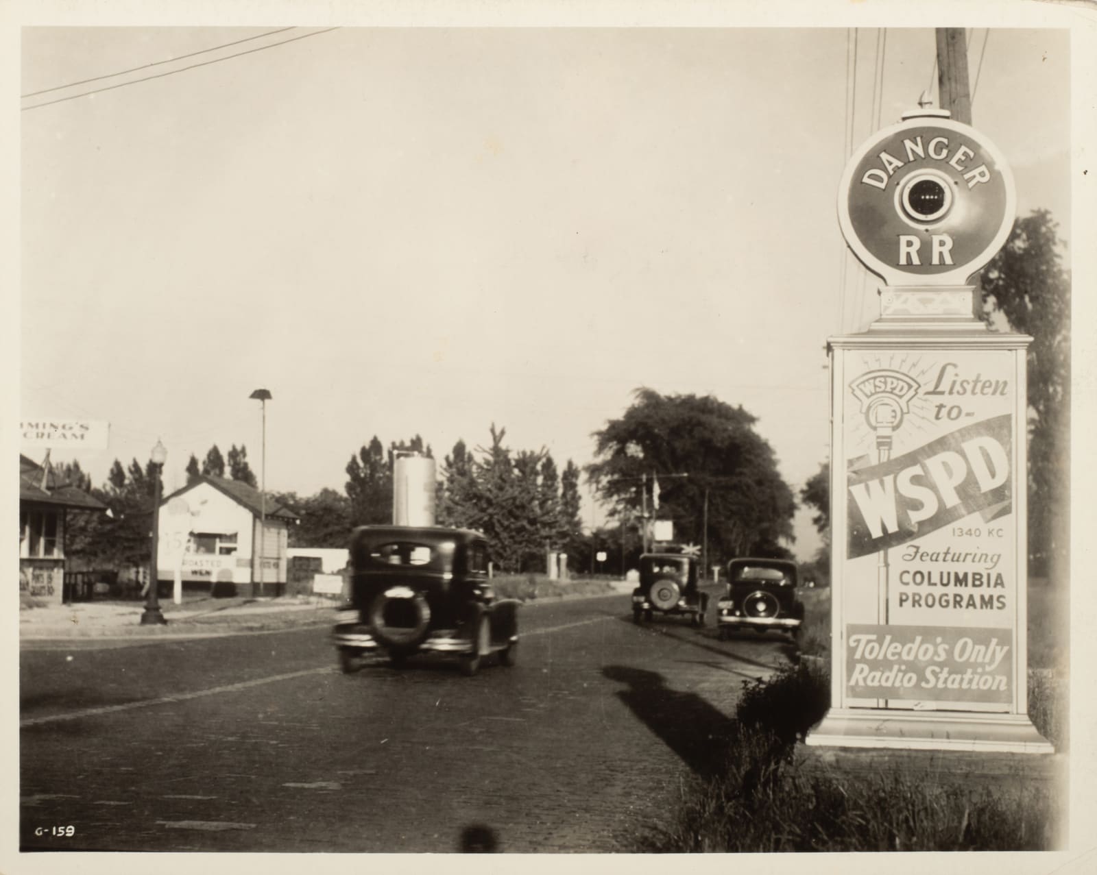 [Traffic Alerts], Photos of Roadside Alert Signs That Also Advertise Champion Spark Plugs and Local Businesses, 1920s-40s
