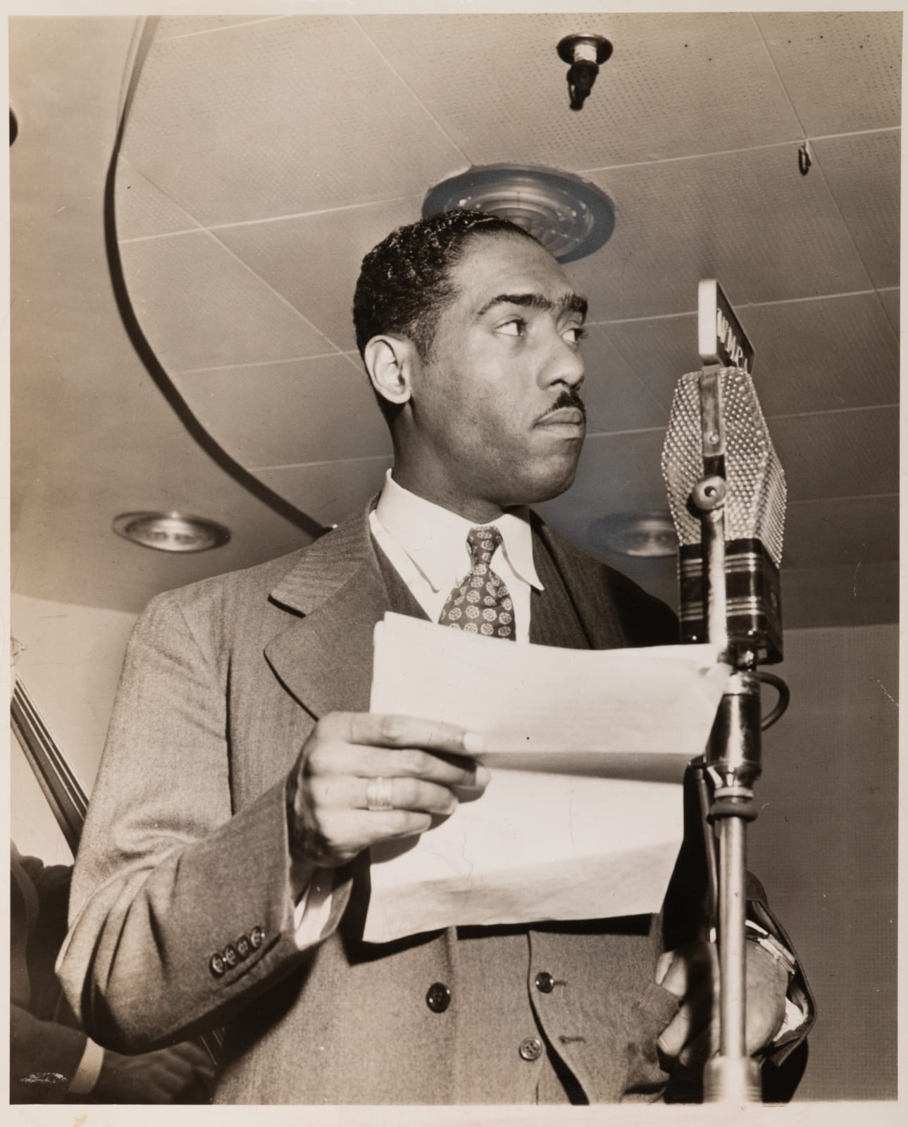 Alexander Alland; Arthur Leipzig; Dale Rooks, Trio of Photos Showing the Important African-American Writer and Journalist Roi Ottley, 1940s