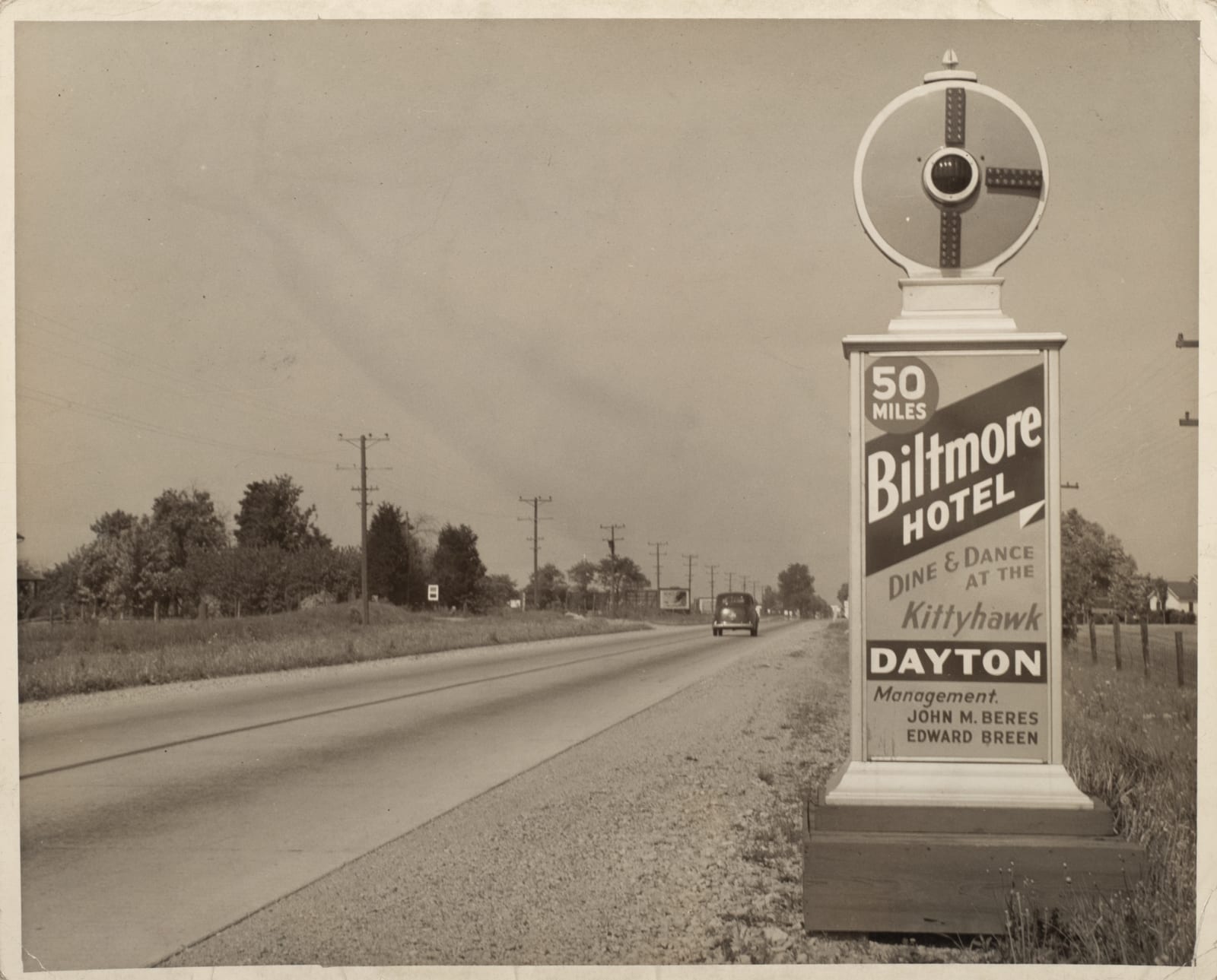 [Traffic Alerts], Photos of Roadside Alert Signs That Also Advertise Champion Spark Plugs and Local Businesses, 1920s-40s
