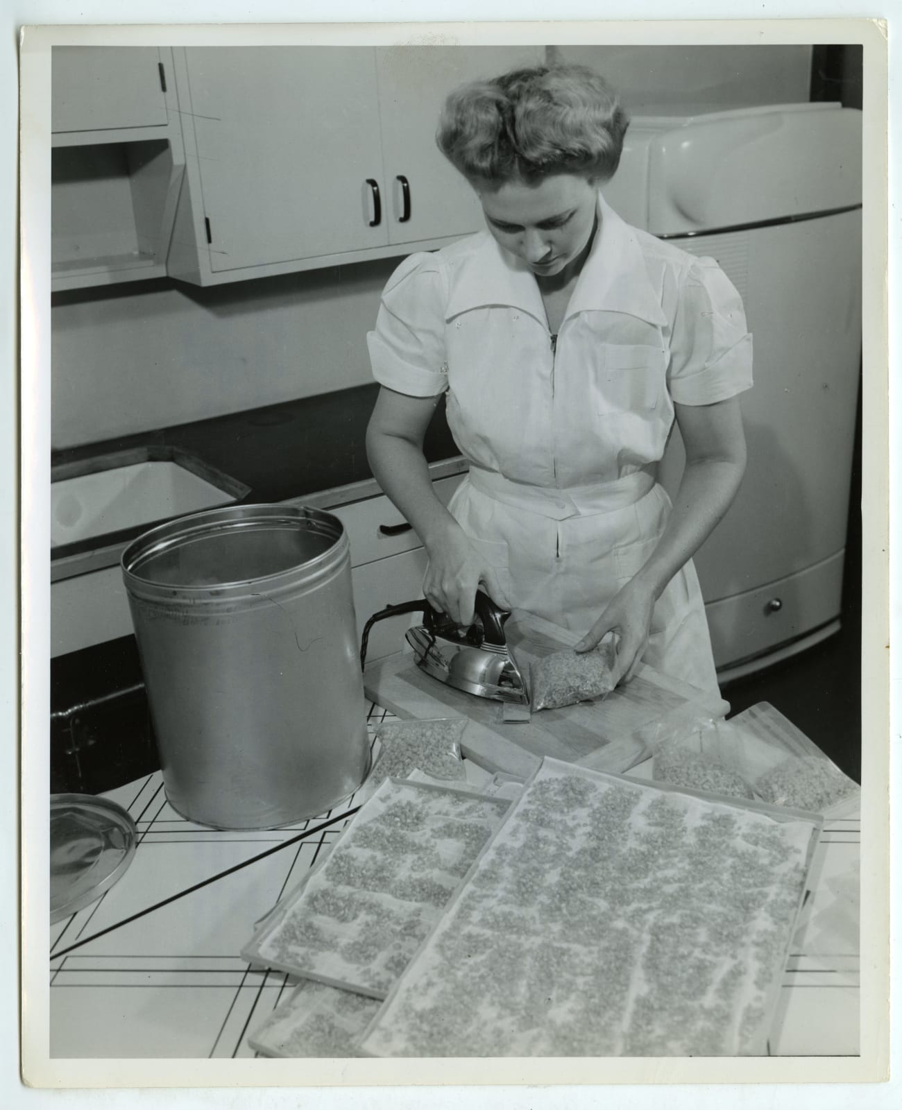 Various Photographers, Large Group of Photos Demonstrating Home-Canning as Part of the "Victory Gardens" War Effort, 1942-44
