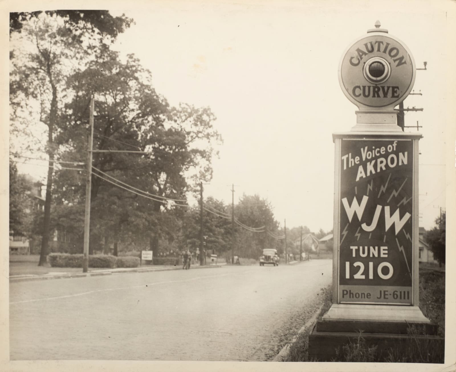 [Traffic Alerts], Photos of Roadside Alert Signs That Also Advertise Champion Spark Plugs and Local Businesses, 1920s-40s
