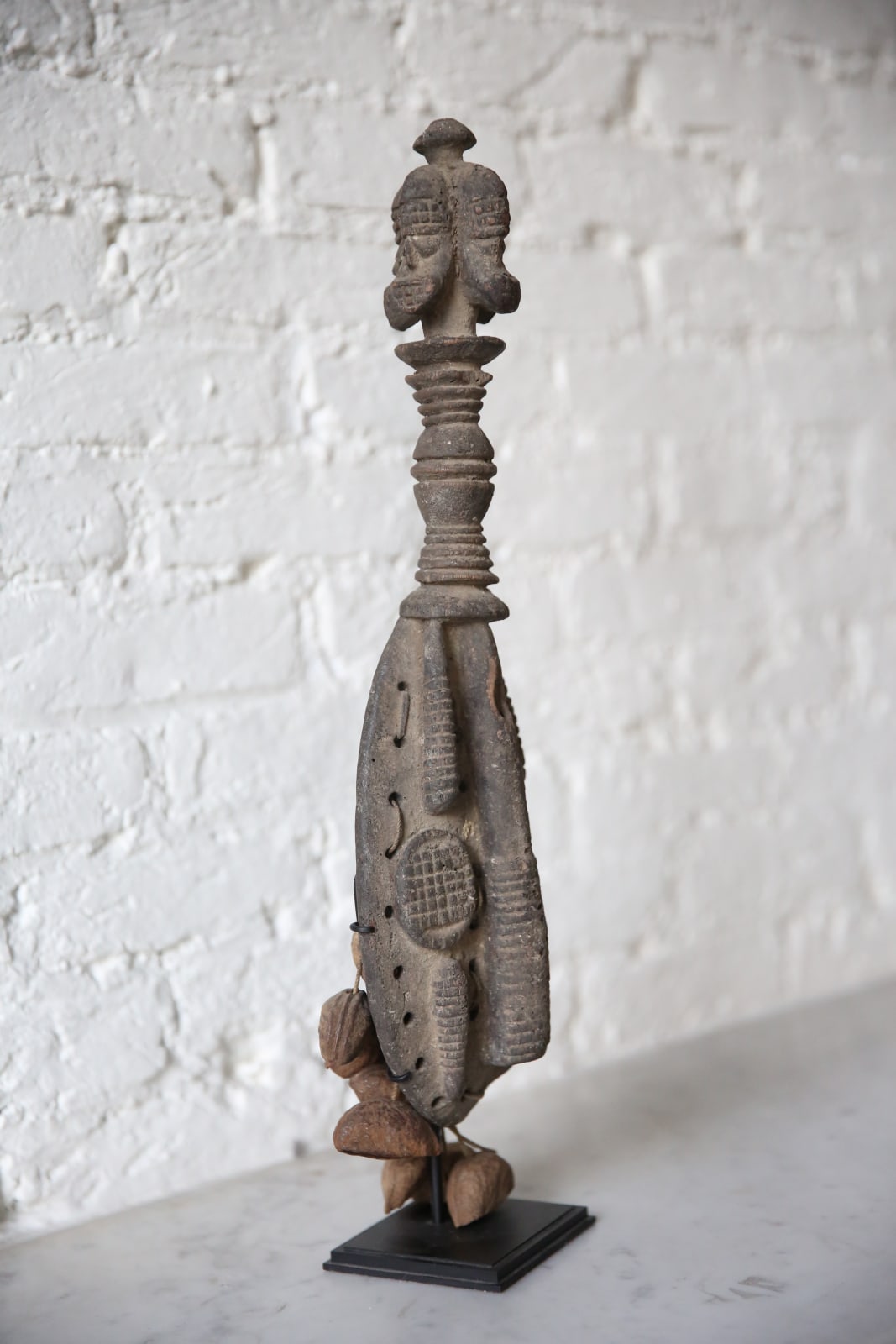 Four-headed Urhobo rattle, Nigeria