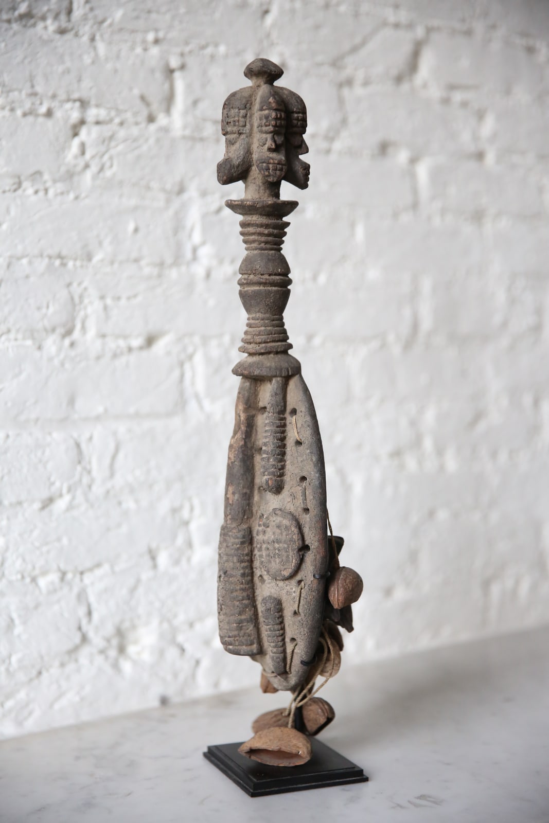 Four-headed Urhobo rattle, Nigeria