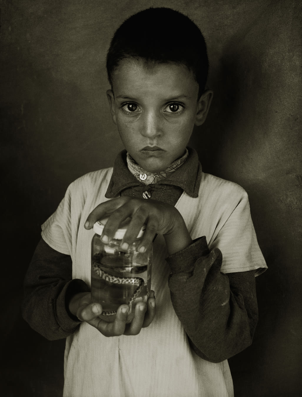 Albert Watson, Mostapha Elhanch, Boy With Jar, Marrakesh, 1997
