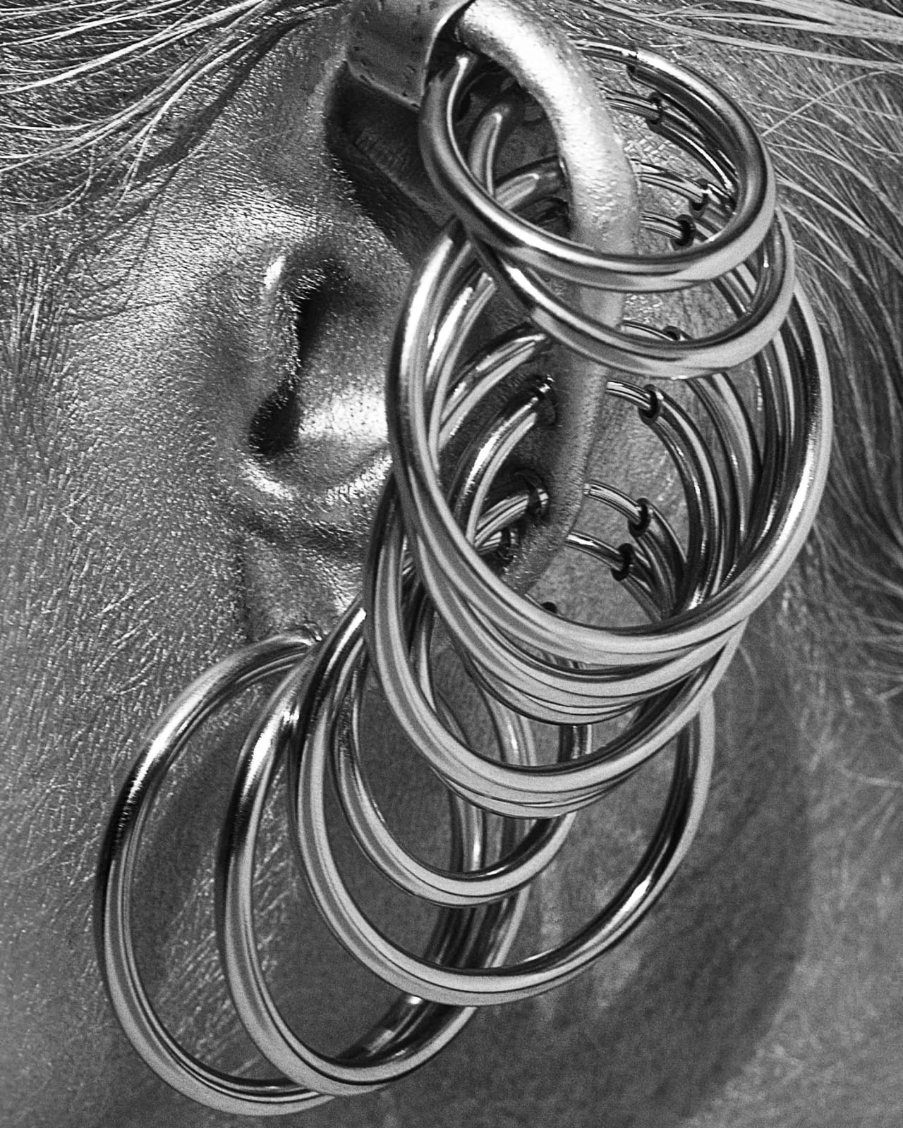 Albert Watson, Lara Young Earrings, Mauritius, 1984