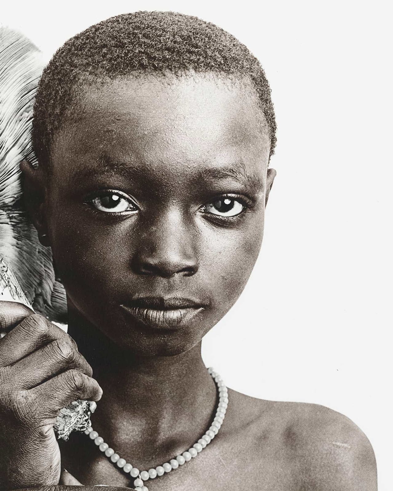 Jan C. Schlegel, Suri tribe girl with mushroom, Ethiopia, 2017