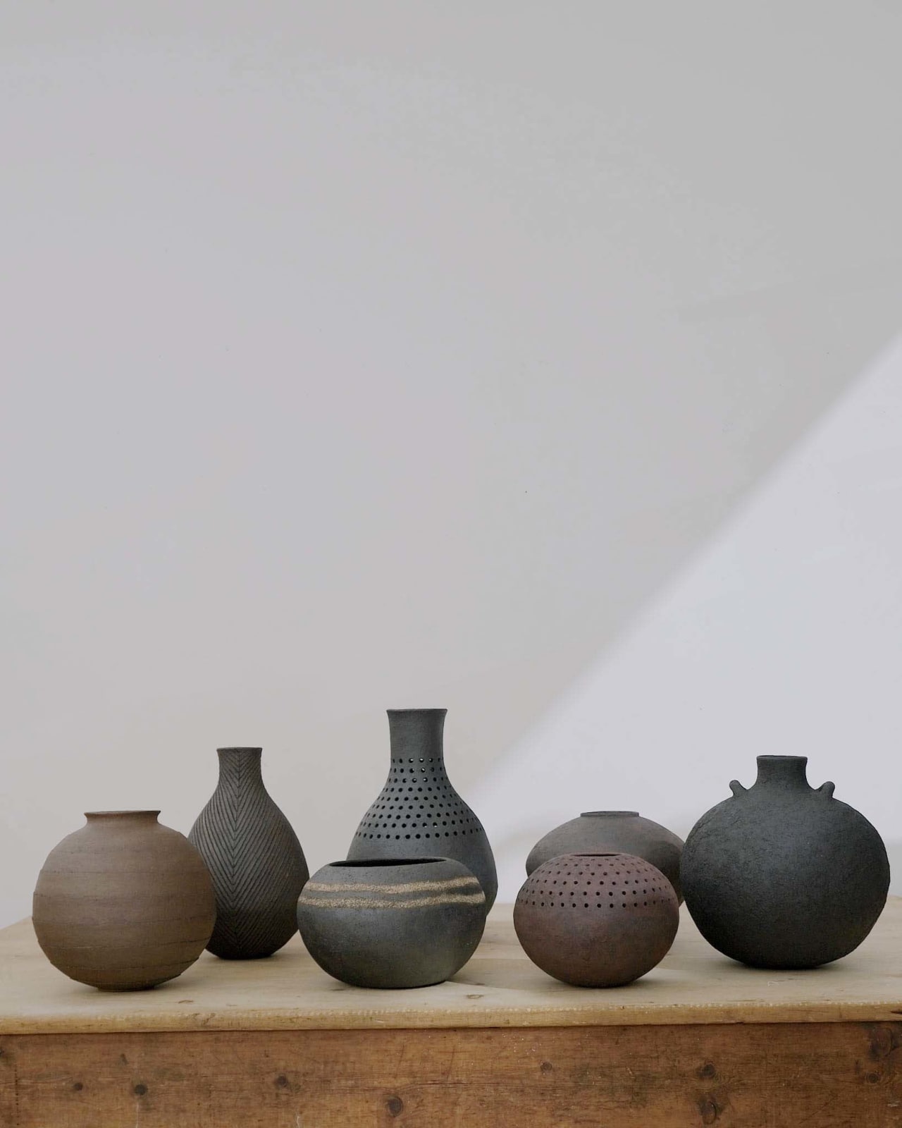 Jane Kite, Black Round Bottle with Handles