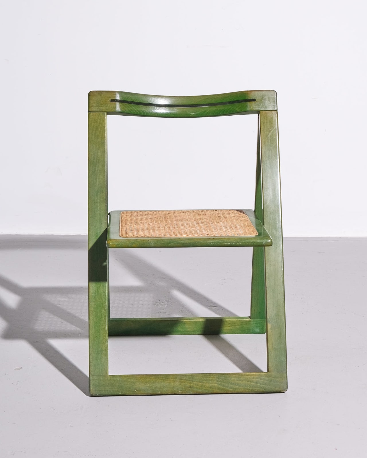 In the style of Aldo Jacober and Pierangela D’Aniello, Green 'Trieste-style' Folding Cane Chair