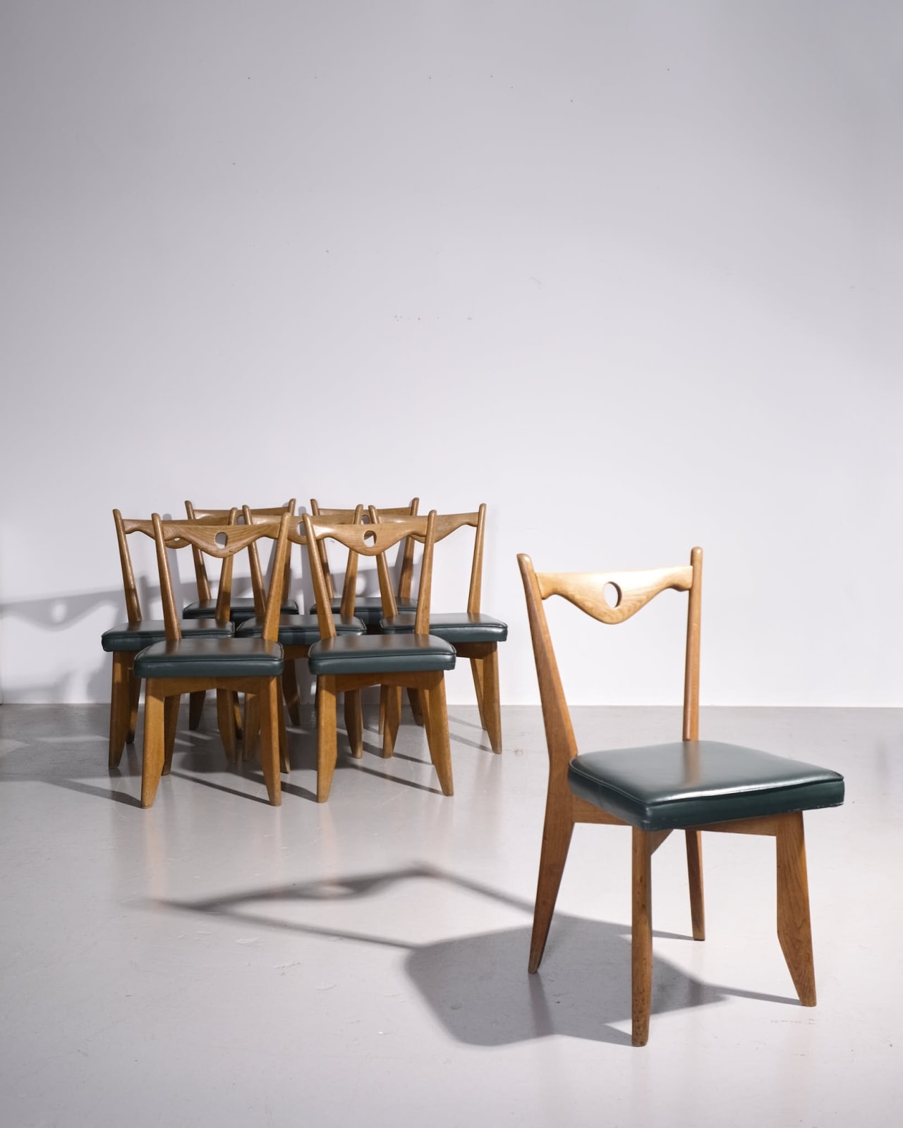 Guillerme et Chambron, Pair of Dining Chairs with circle cut out