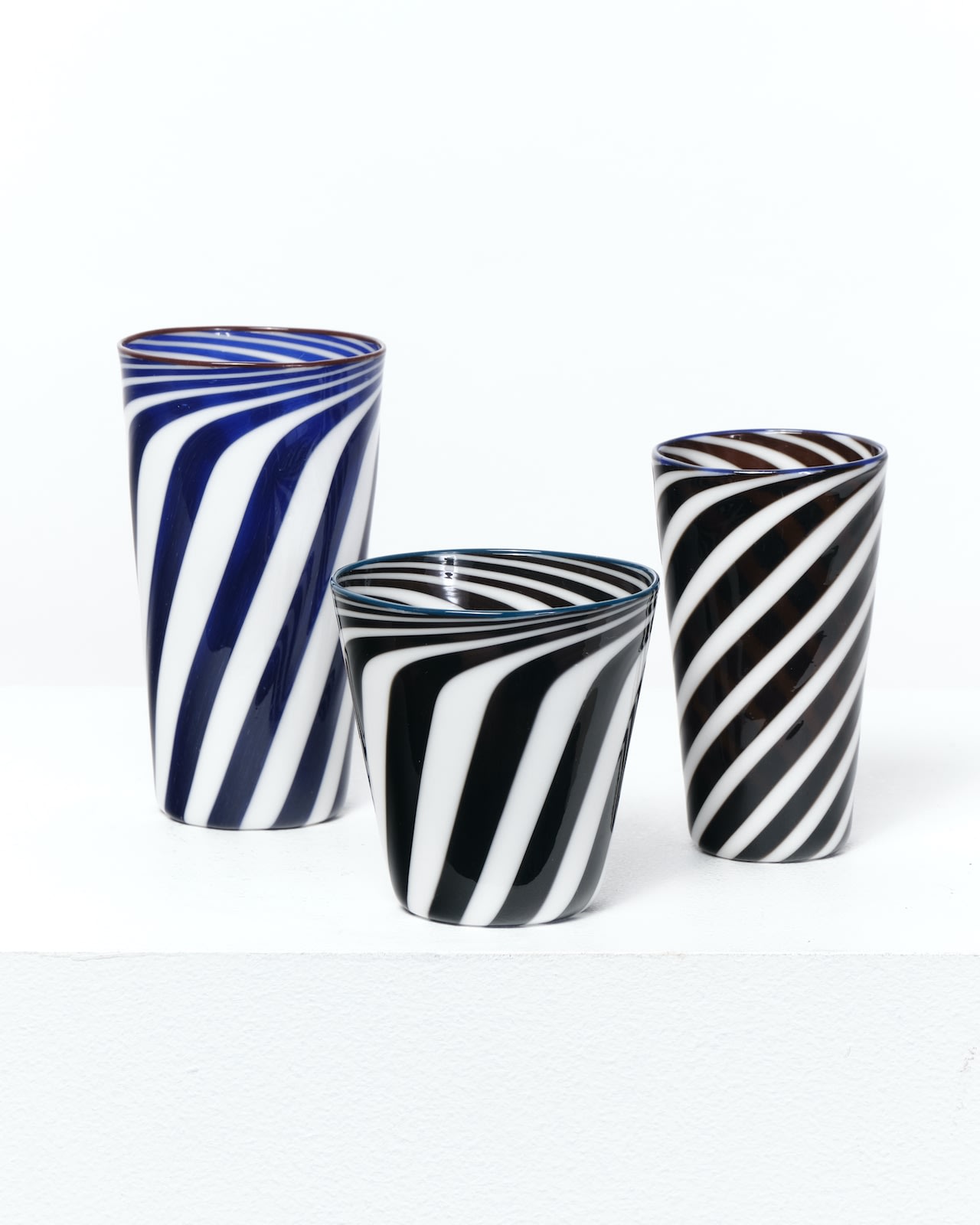 Laurence Brabant and Alain Villechange, White and grey tumbler with blue border