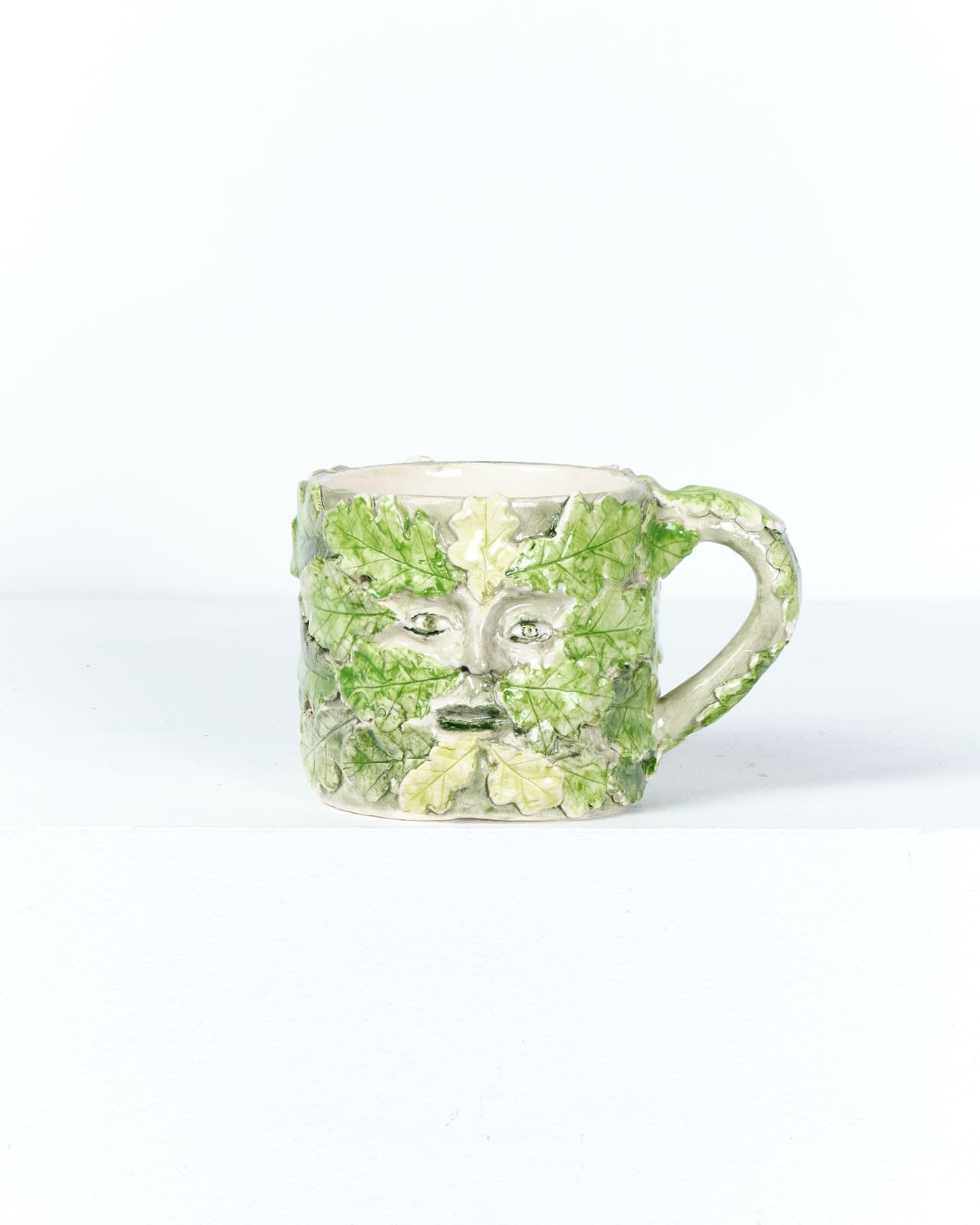 Prue Piper, Green man vessel with handle