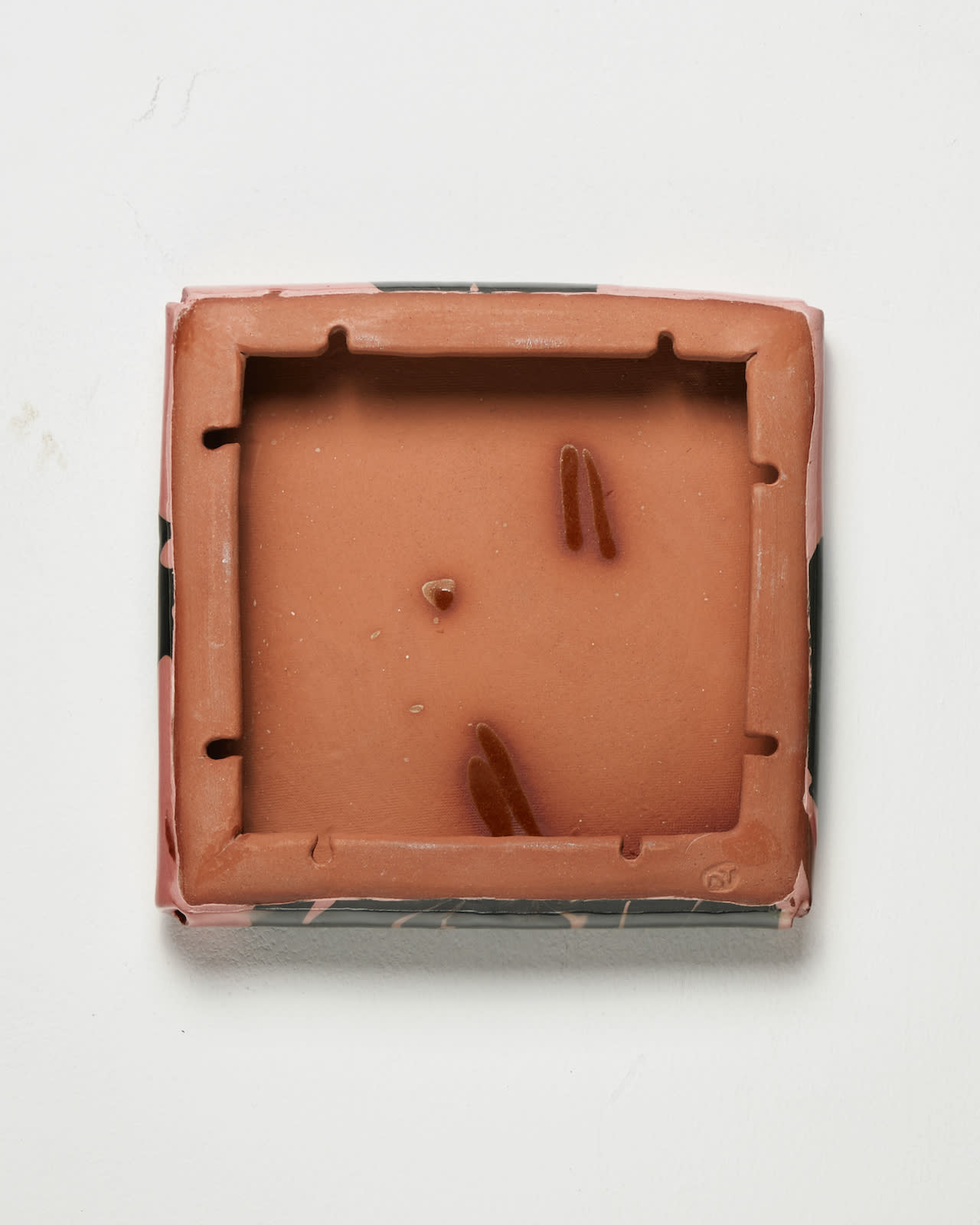 Nicola Tassie, Slip pillow slip trailing black on pink