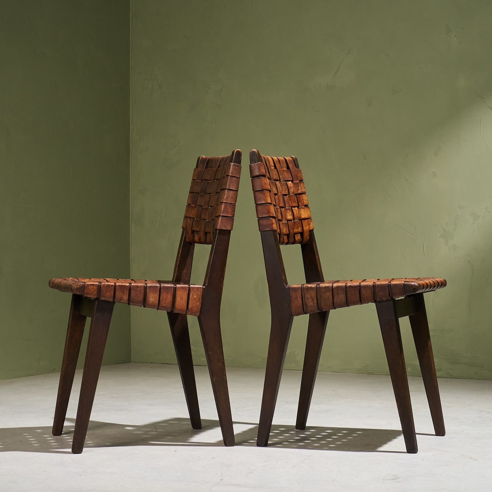 Jens Risom, Set of 8 Chairs in Patinated Cognac Leather and Stained Oak, United States, Late 1940s