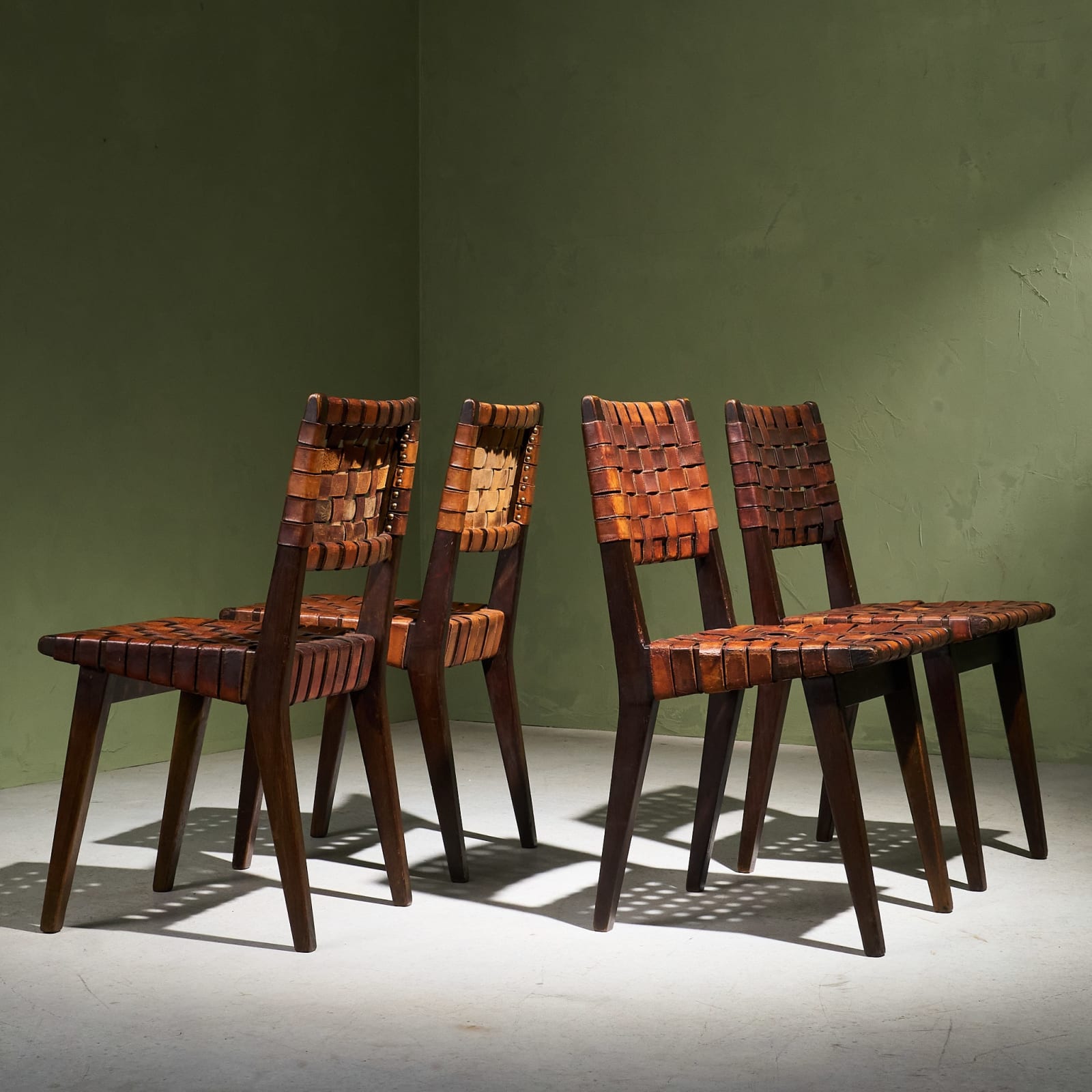 Jens Risom, Set of 12 Chairs in Patinated Cognac Leather and Stained Oak, United States, 1940s