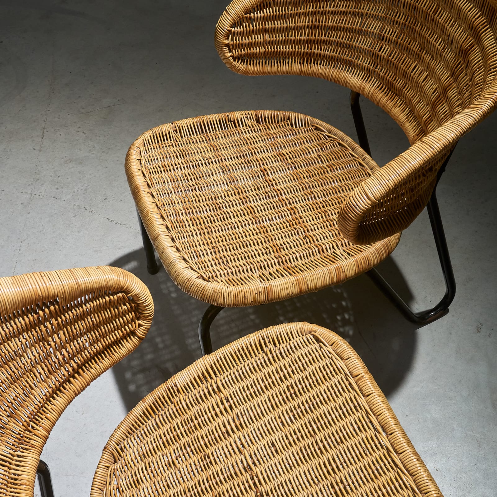 Dirk van Sliedregt, Lounge Chairs in Rattan with Black Tubular Steel frame by Gebroeders Jonkers, The Netherlands, 1960's